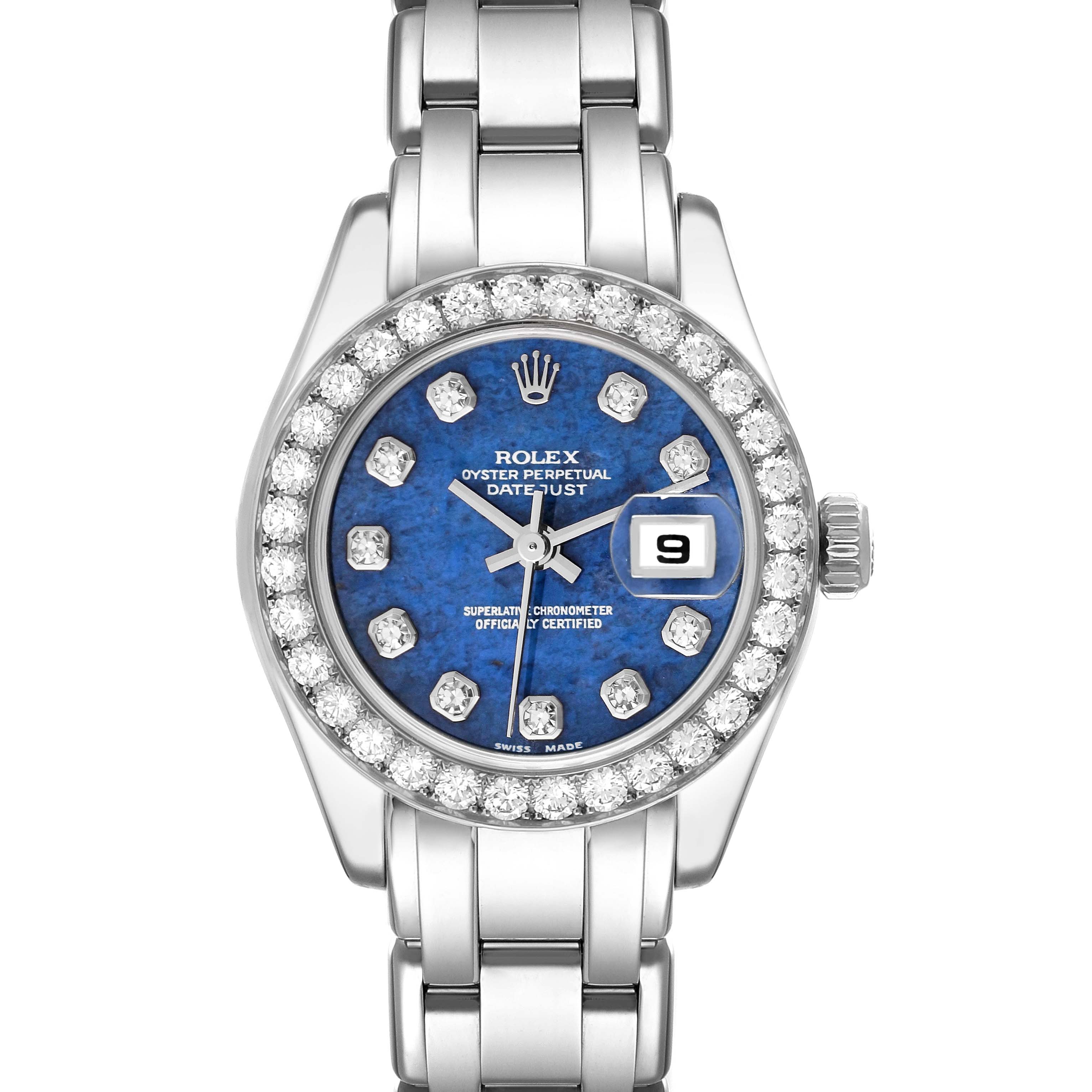 This image shows a front view of a Rolex Pearlmaster 80299 Women's White Gold Blue Dial 80299 Women's White Gold Blue Dial watch, highlighting its blue dial, diamond bezel, and metal bracelet.
