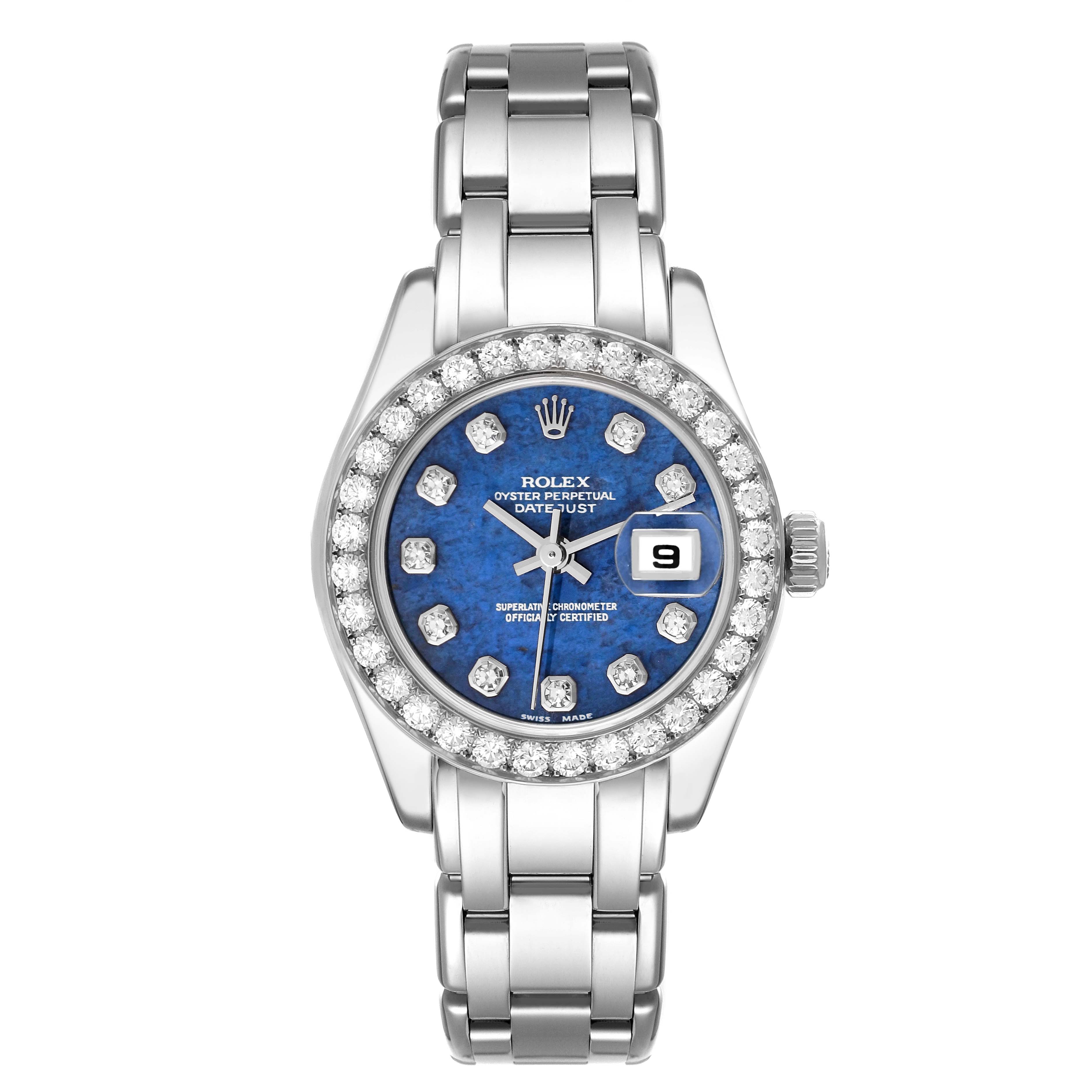 The Rolex Pearlmaster 80299 Women's White Gold Blue Dial 80299 Women's White Gold Blue Dial watch is shown from a front angle, displaying its blue dial, diamond bezel, and metal bracelet.