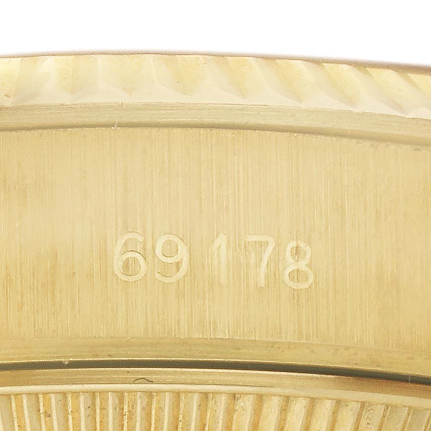 This is a close-up view of the case back of a Rolex President 69178 Women's Yellow Gold Champagne Dial 69178 Women's Yellow Gold Champagne Dial model watch, showing the model number 69178.