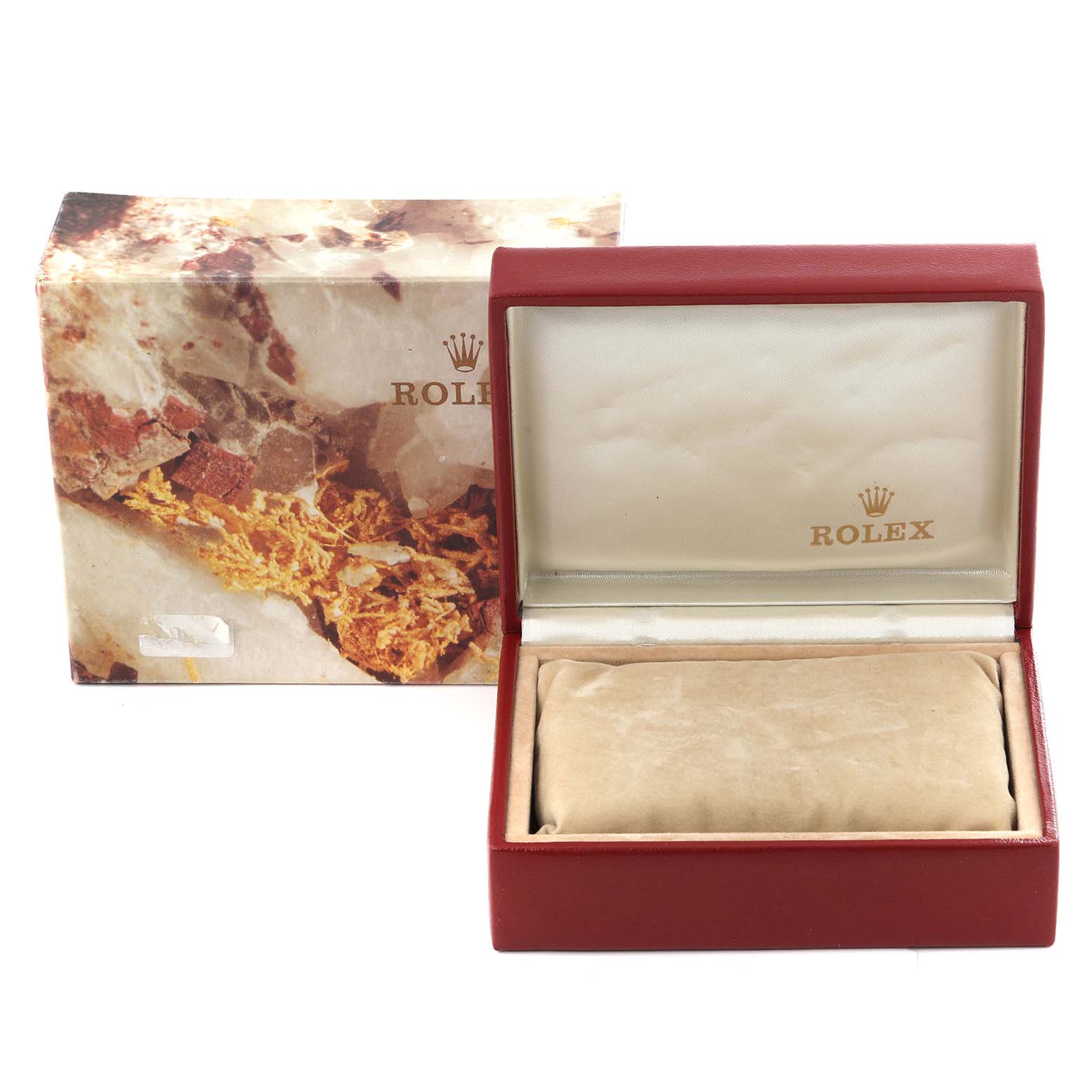 This image shows an open red Rolex President 69178 Women's Yellow Gold Champagne Dial 69178 Women's Yellow Gold Champagne Dial model watch box and its outer packaging with a rocky design.