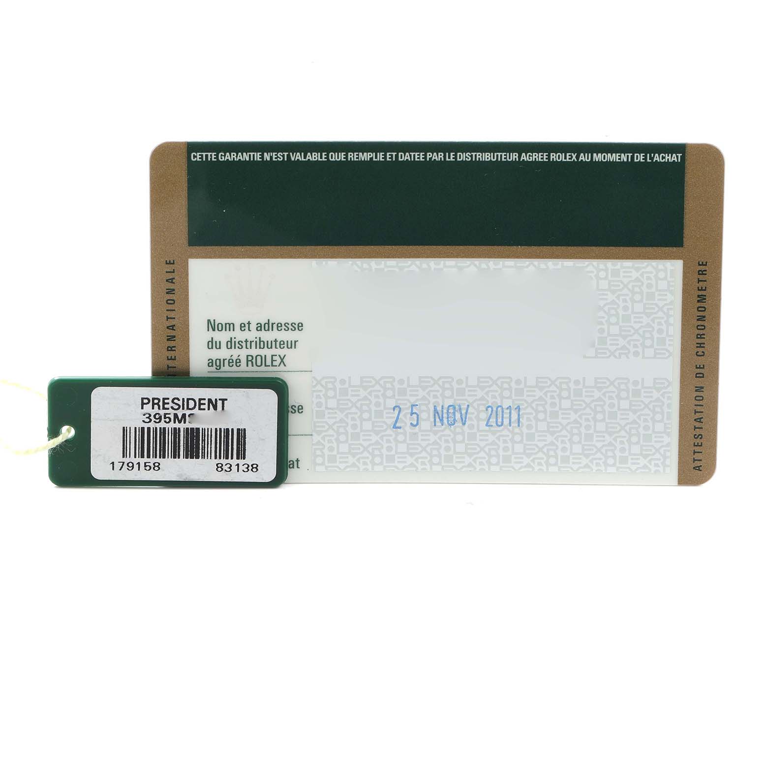 The image shows a Rolex Datejust 179158 Women
s Yellow Gold Champagne Dial warranty card with a hang tag, viewed from above.