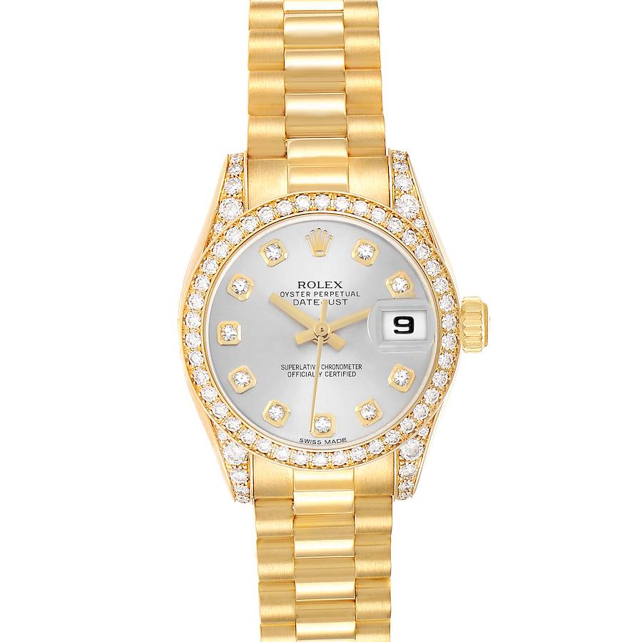 The Rolex President 179158 Women's Yellow Gold Silver Dial model is shown from a top-down angle, displaying the dial, bracelet, bezel with diamonds, and date feature.