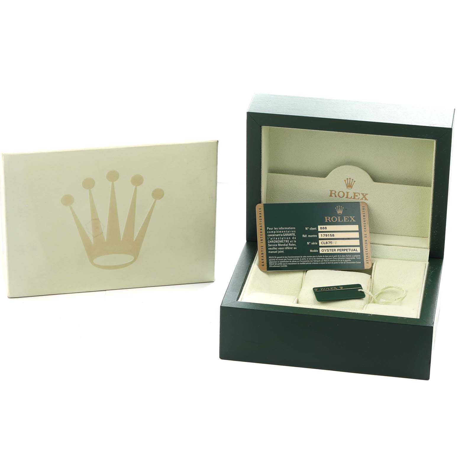 The image shows the packaging and accessories for the Rolex President 179158 Women
s Yellow Gold Silver Dial model, including the box, warranty card, and tag at a front angle.
