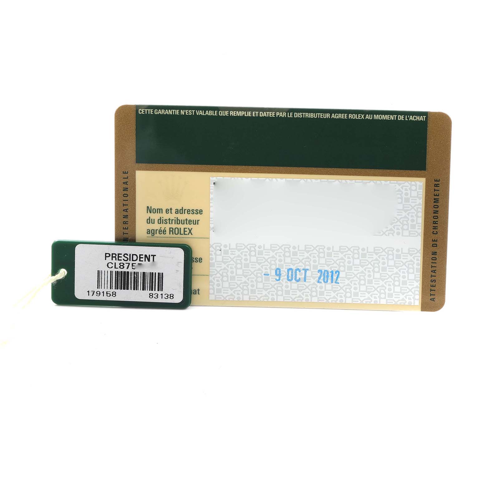 The image shows a warranty card and tag for a Rolex President 179158 Women
s Yellow Gold Silver Dial model.