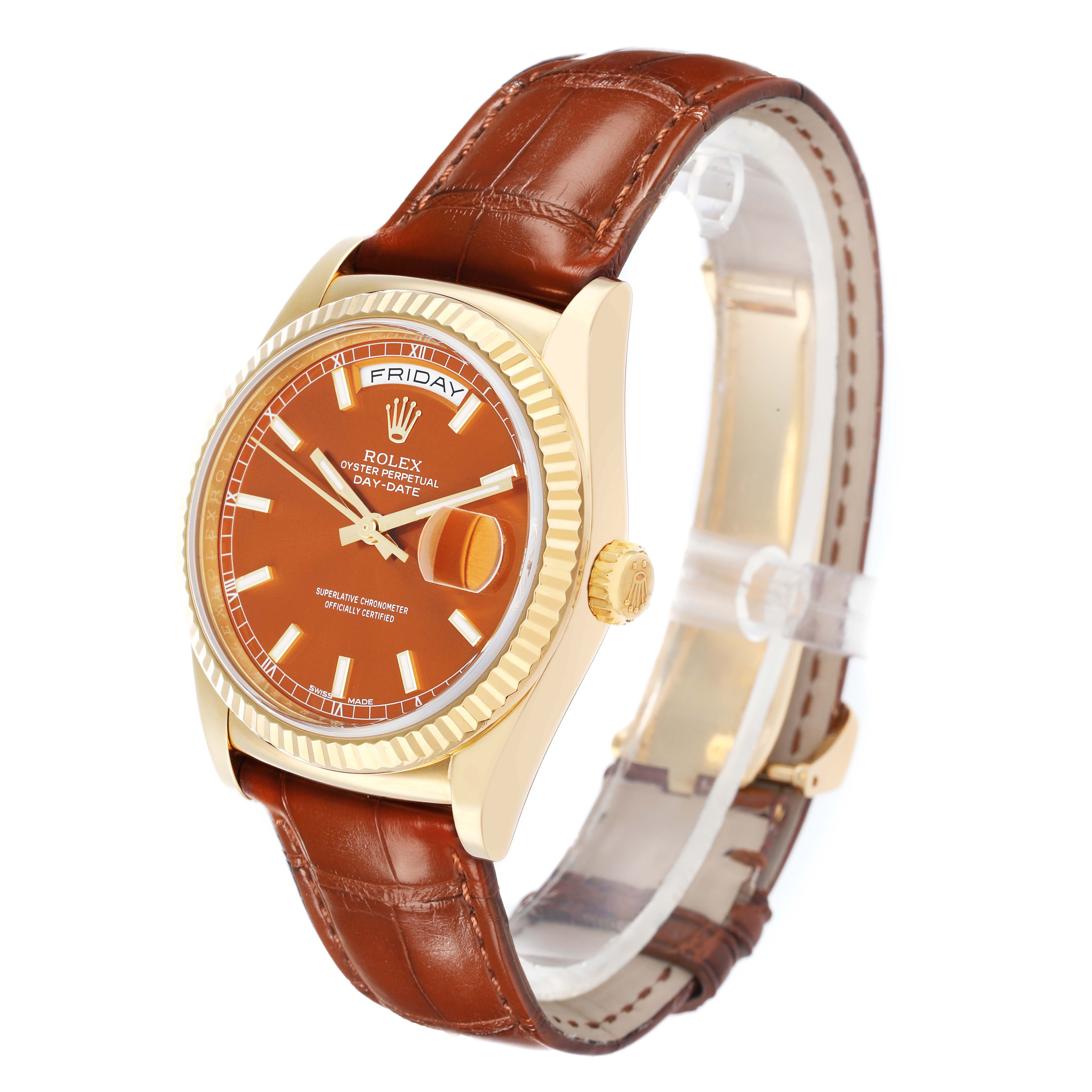 The Rolex President 118139 Men
s Yellow Gold Orange Dial model watch is shown at a slight angle, displaying the face, bezel, crown, and leather strap.