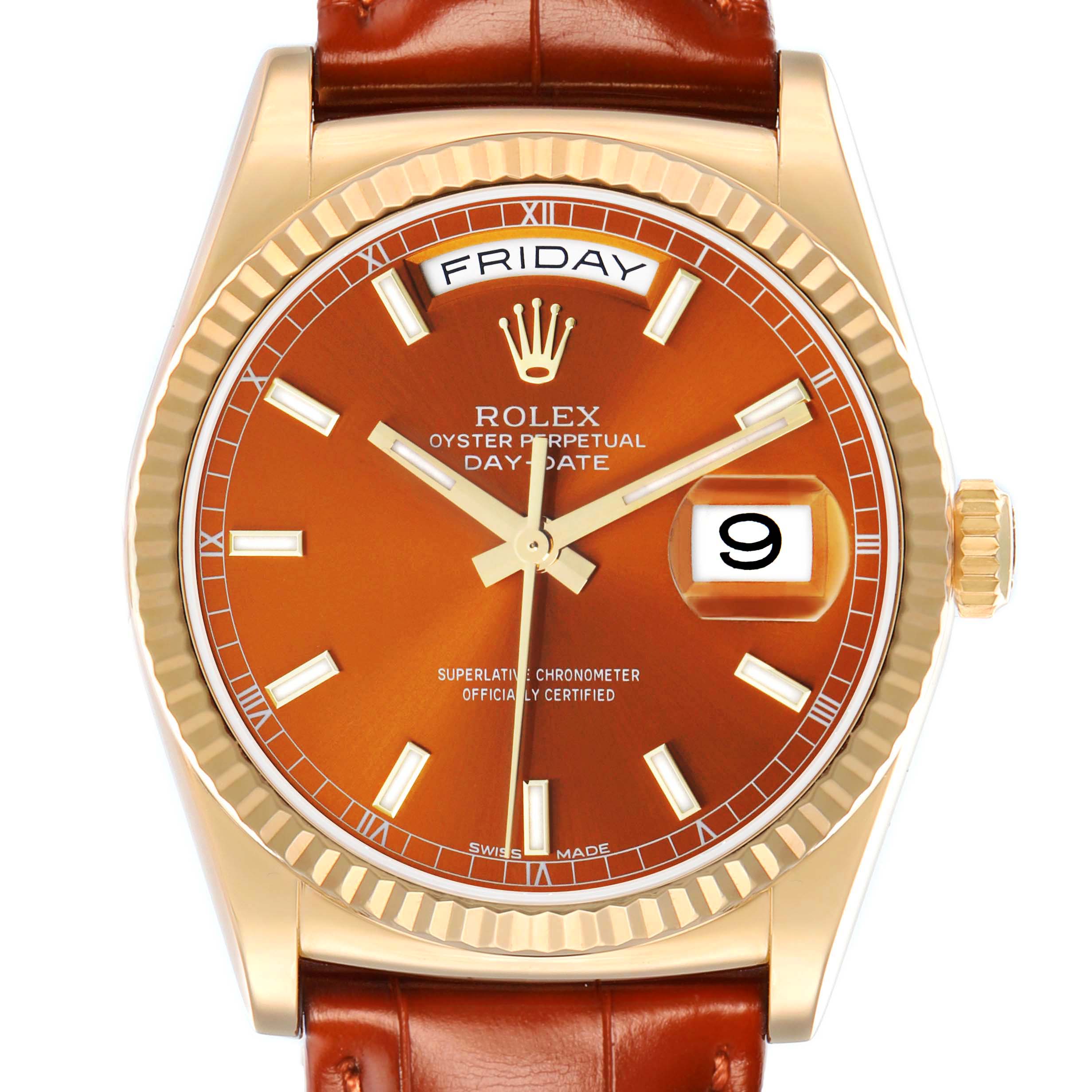 The Rolex President 118139 Men
s Yellow Gold Orange Dial Day-Date watch is shown from a frontal angle, showcasing its dial, bezel, crown, and leather strap.