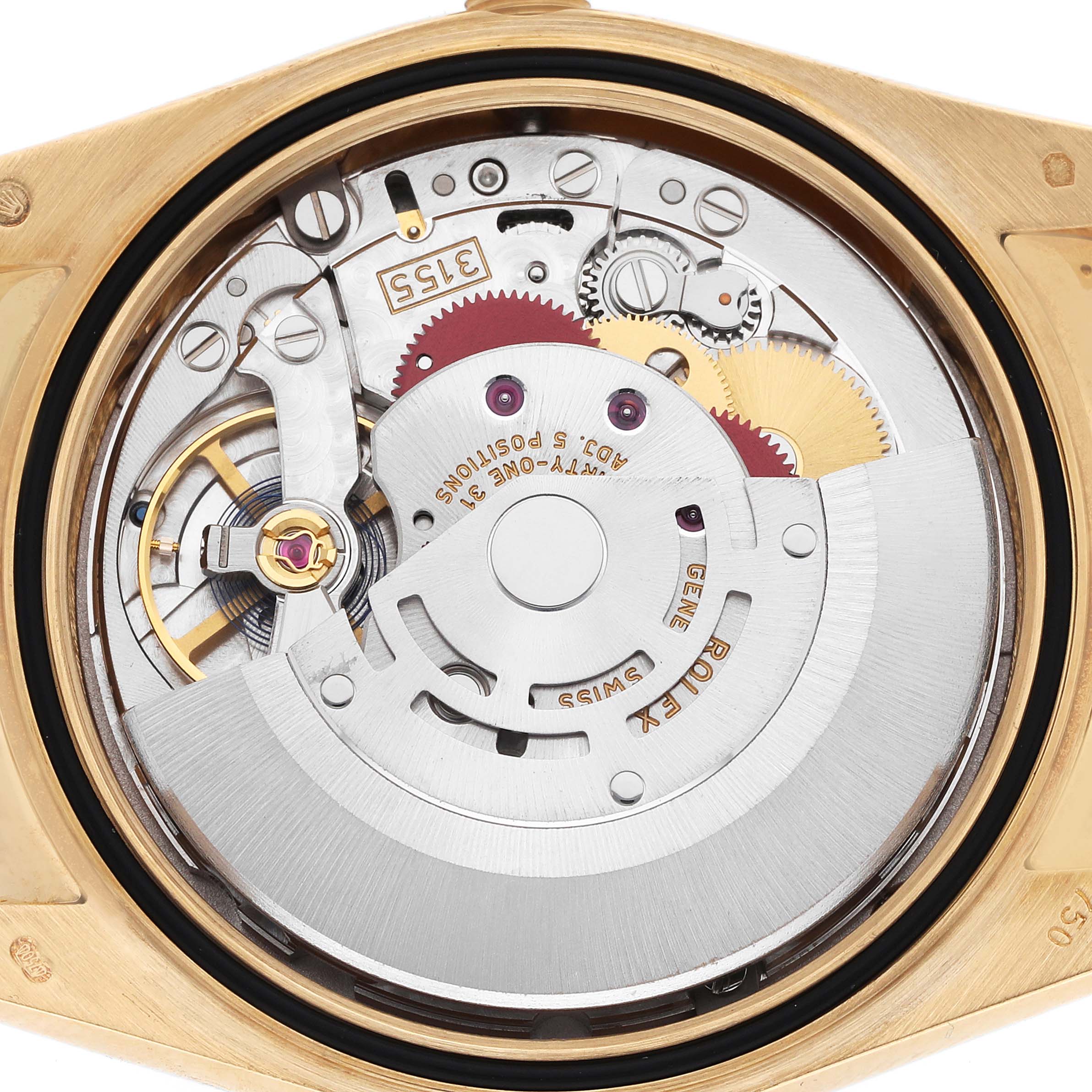 The image shows the movement of a Rolex President 118139 Men
s Yellow Gold Orange Dial watch, viewed from the back, highlighting gears and the rotor.