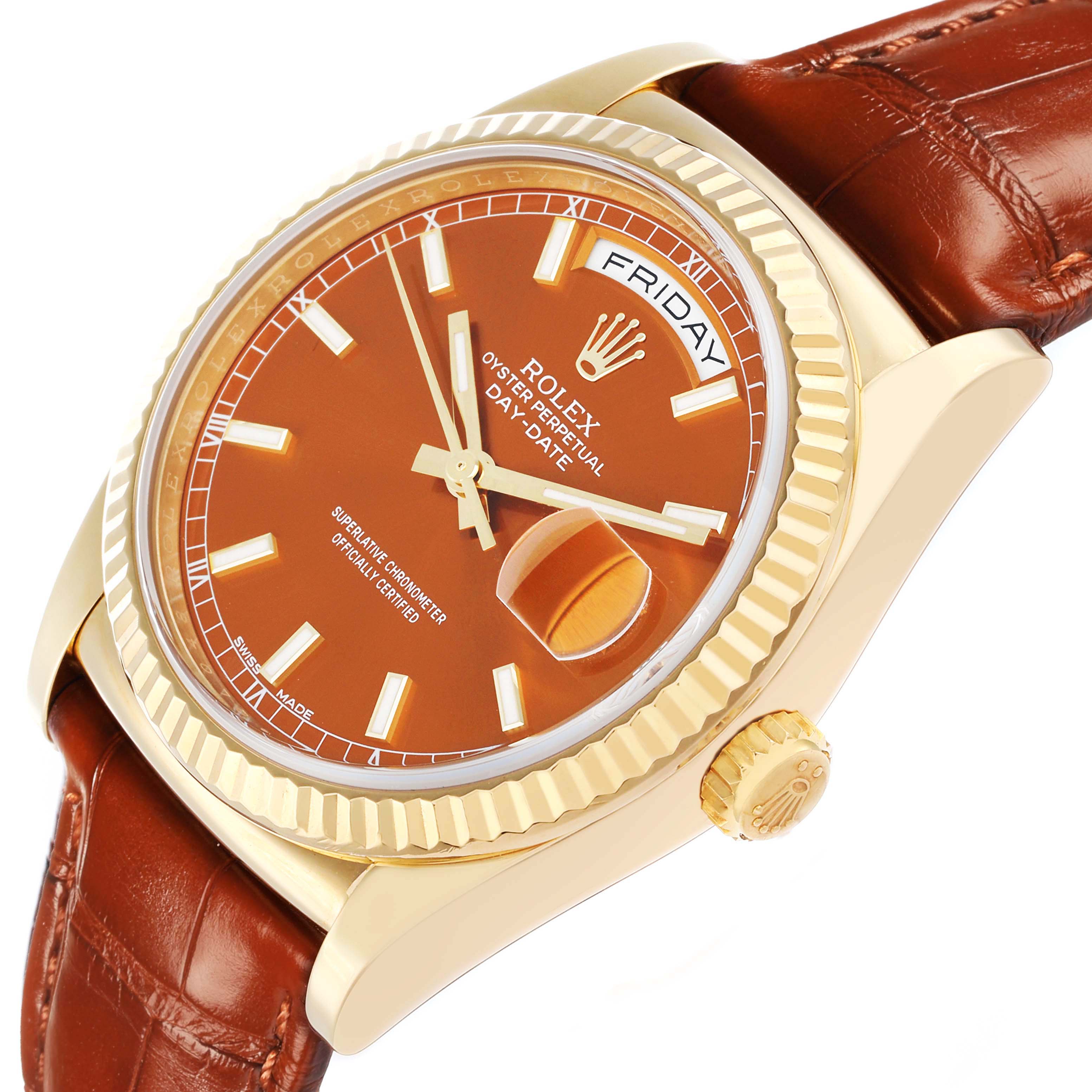 The Rolex President 118139 Men
s Yellow Gold Orange Dial model watch is shown at an oblique angle highlighting the dial, crown, and leather strap.