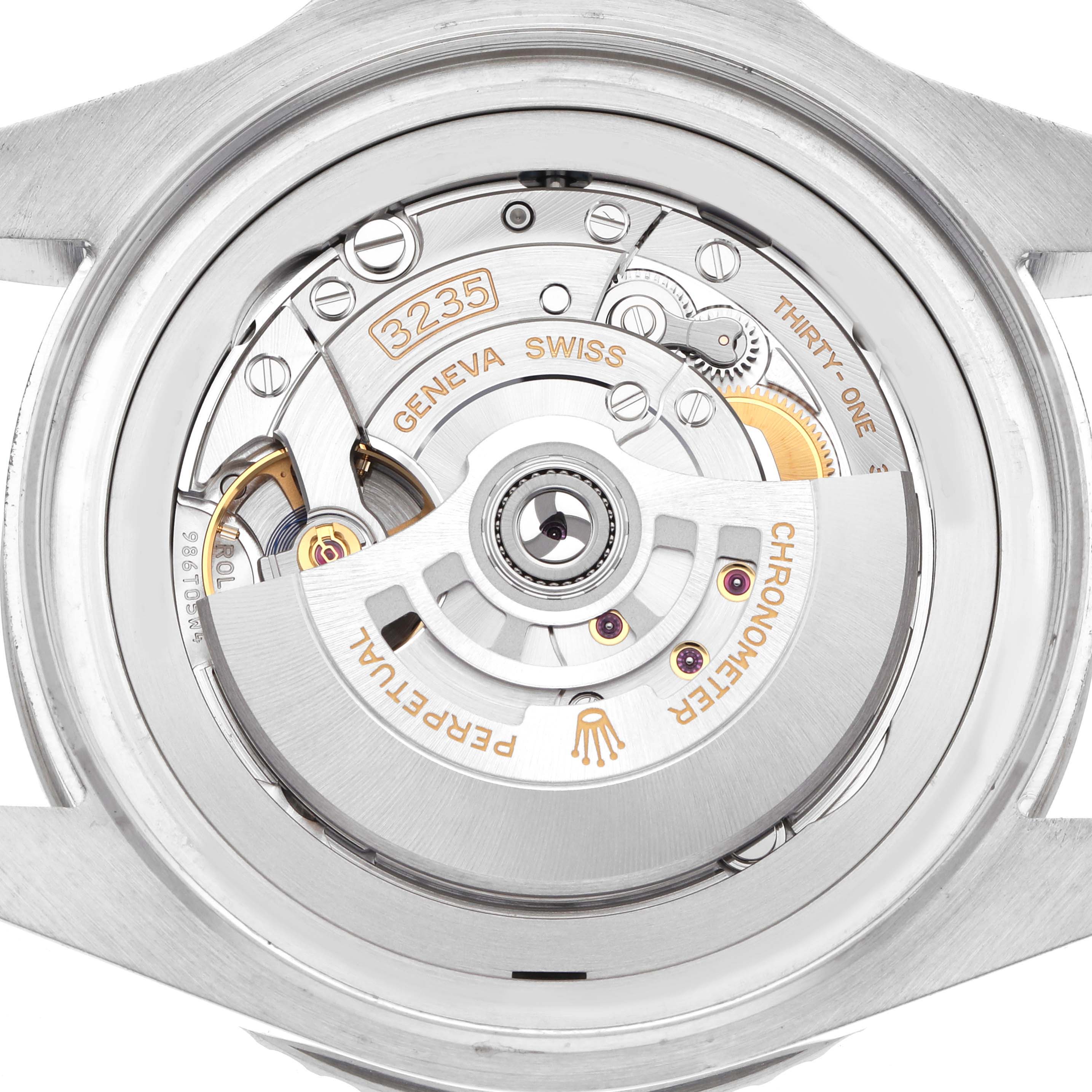 The image shows the back view of a Rolex Sea-Dweller 136660 Men
s Stainless Steel Black Dial, highlighting its mechanical movement and rotor.