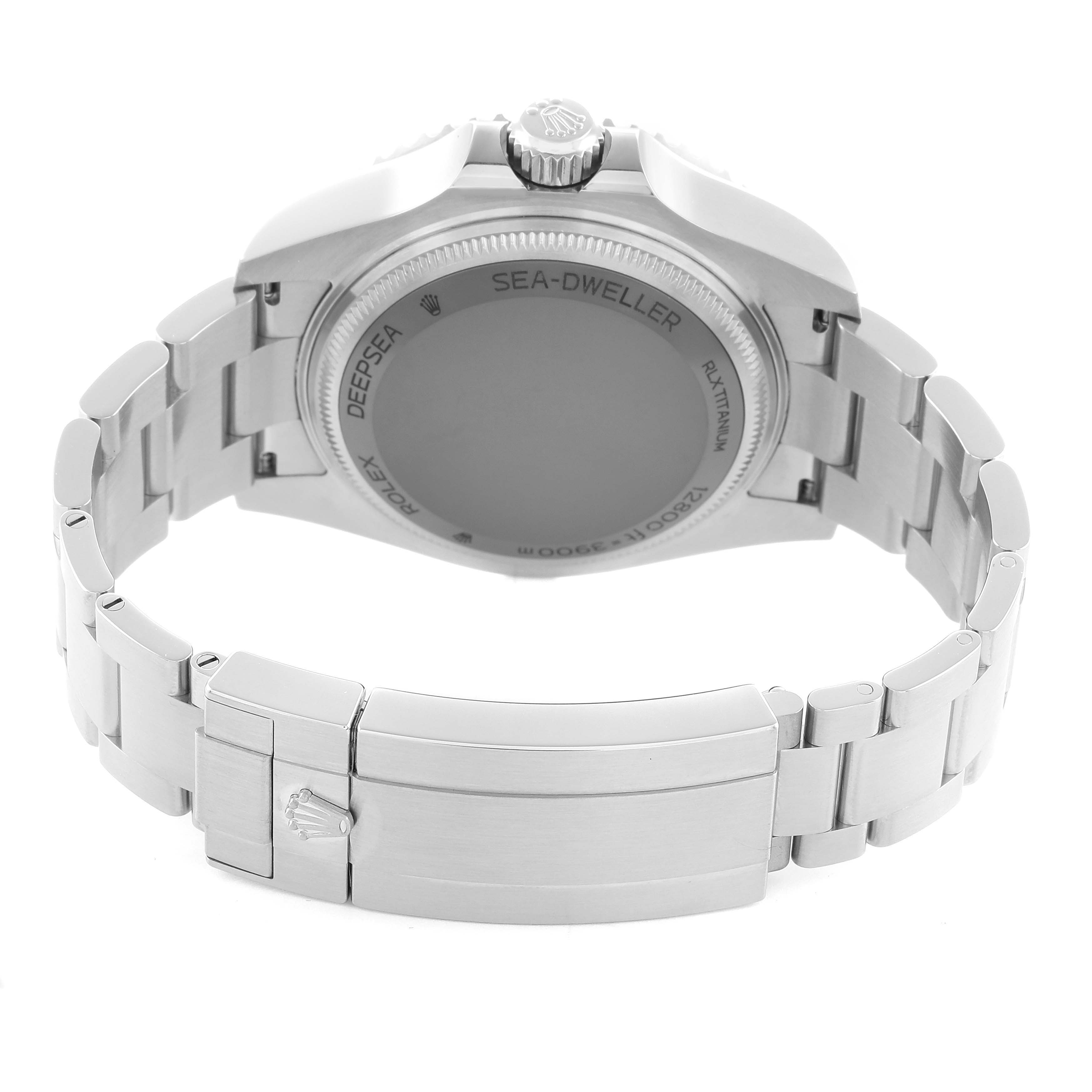 The image shows the back view of a Rolex Sea-Dweller 136660 Men
s Stainless Steel Blue Dial watch, highlighting the case back, crown, and bracelet clasp.