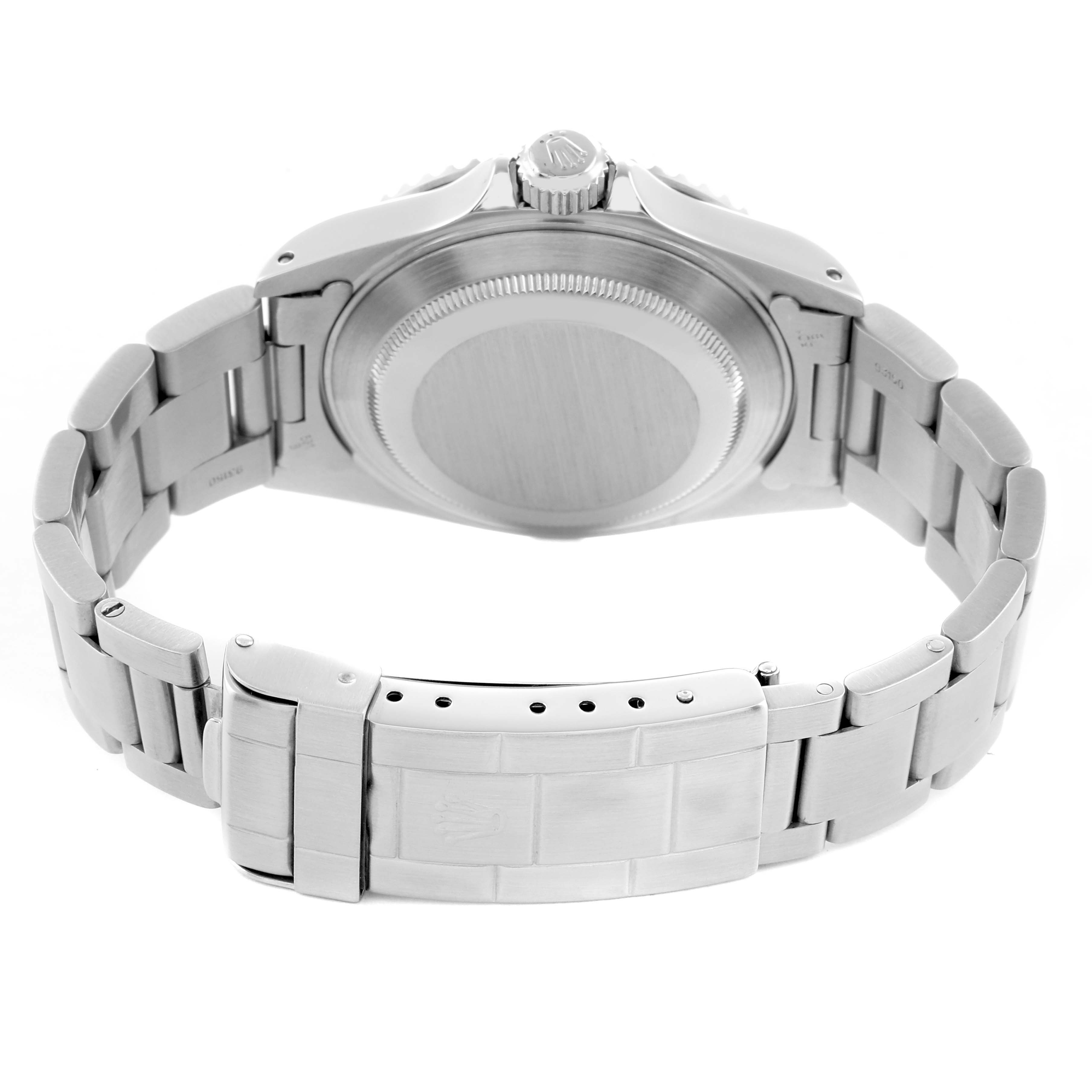 The Rolex Submariner 14060 Men
s Stainless Steel Black Dial watch is shown from the back, highlighting the case back, bracelet, and clasp.