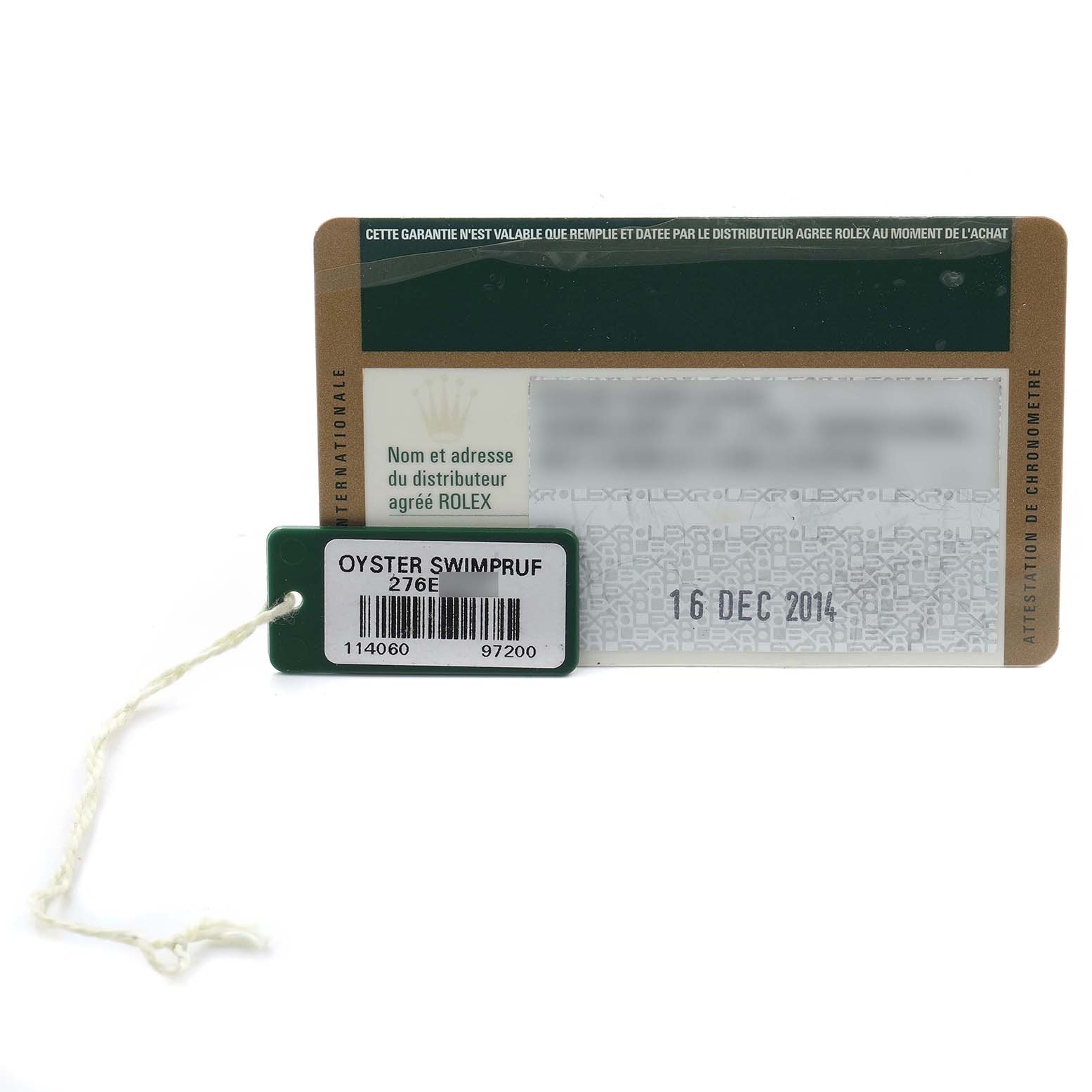 The image shows a warranty card and tag for a Rolex Submariner 114060 Men
s Stainless Steel Black Dial, with model details visible.