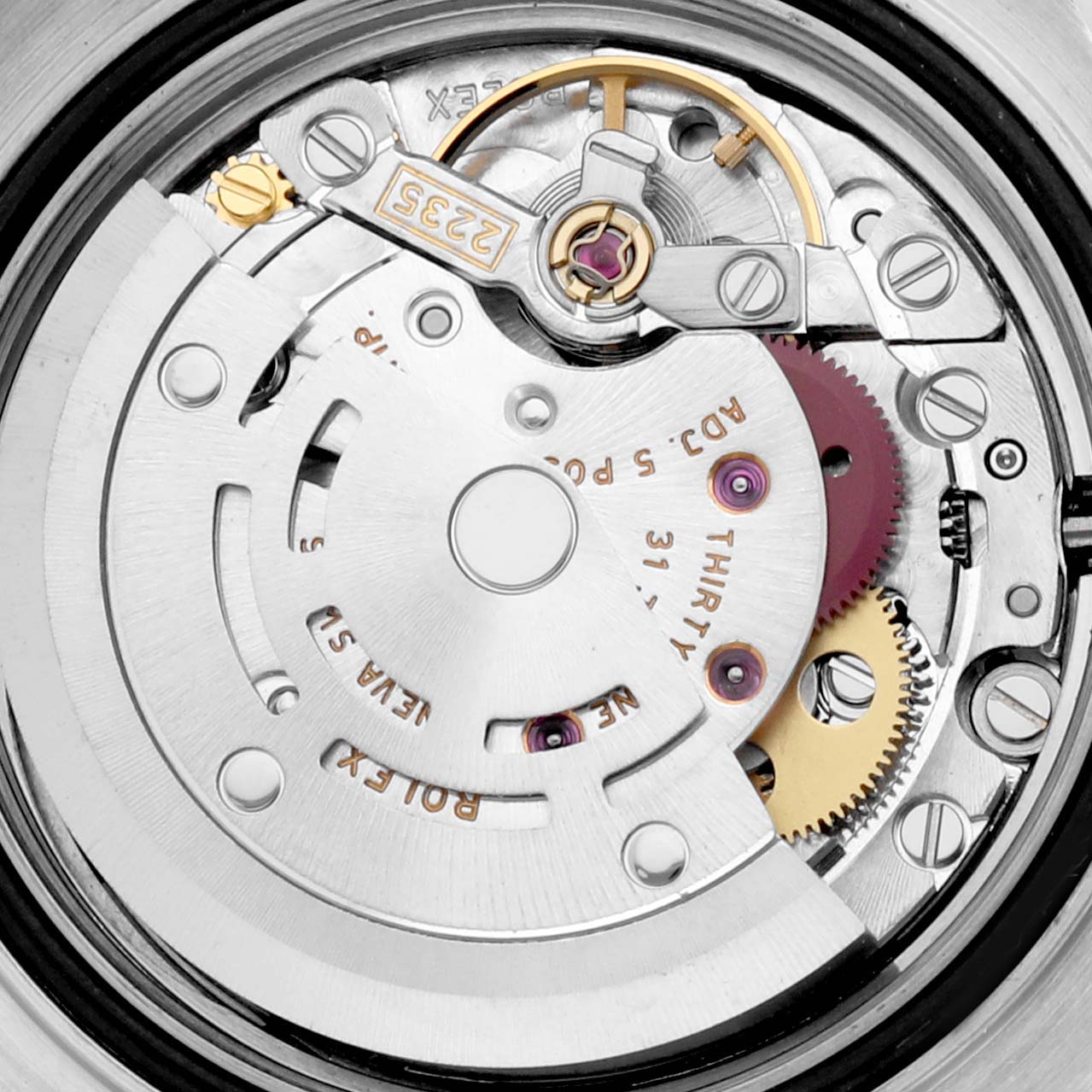 This is a close-up of the movement mechanism inside a Rolex Yacht-Master 169623 Women's Steel and Gold (two tone) Grey Dial 169623 Women's Steel and Gold (two tone) Grey Dial watch, detailing gears and components.