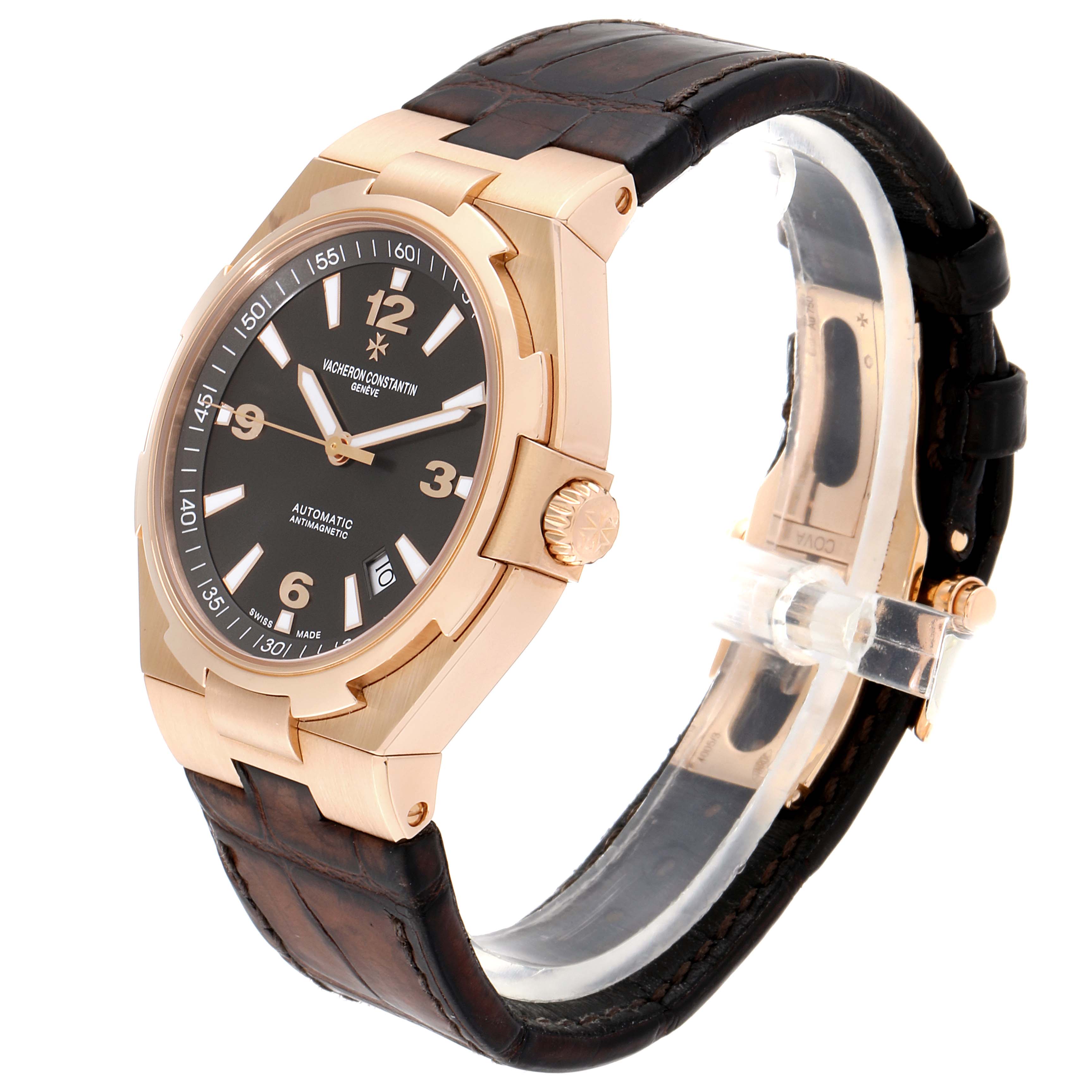 The Vacheron Constantin Overseas 47040/000R-9666 Men's Rose Gold Black Dial 47040/000R-9666 Men's Rose Gold Black Dial watch is shown at a slight angle, highlighting its face, crown, and leather strap.