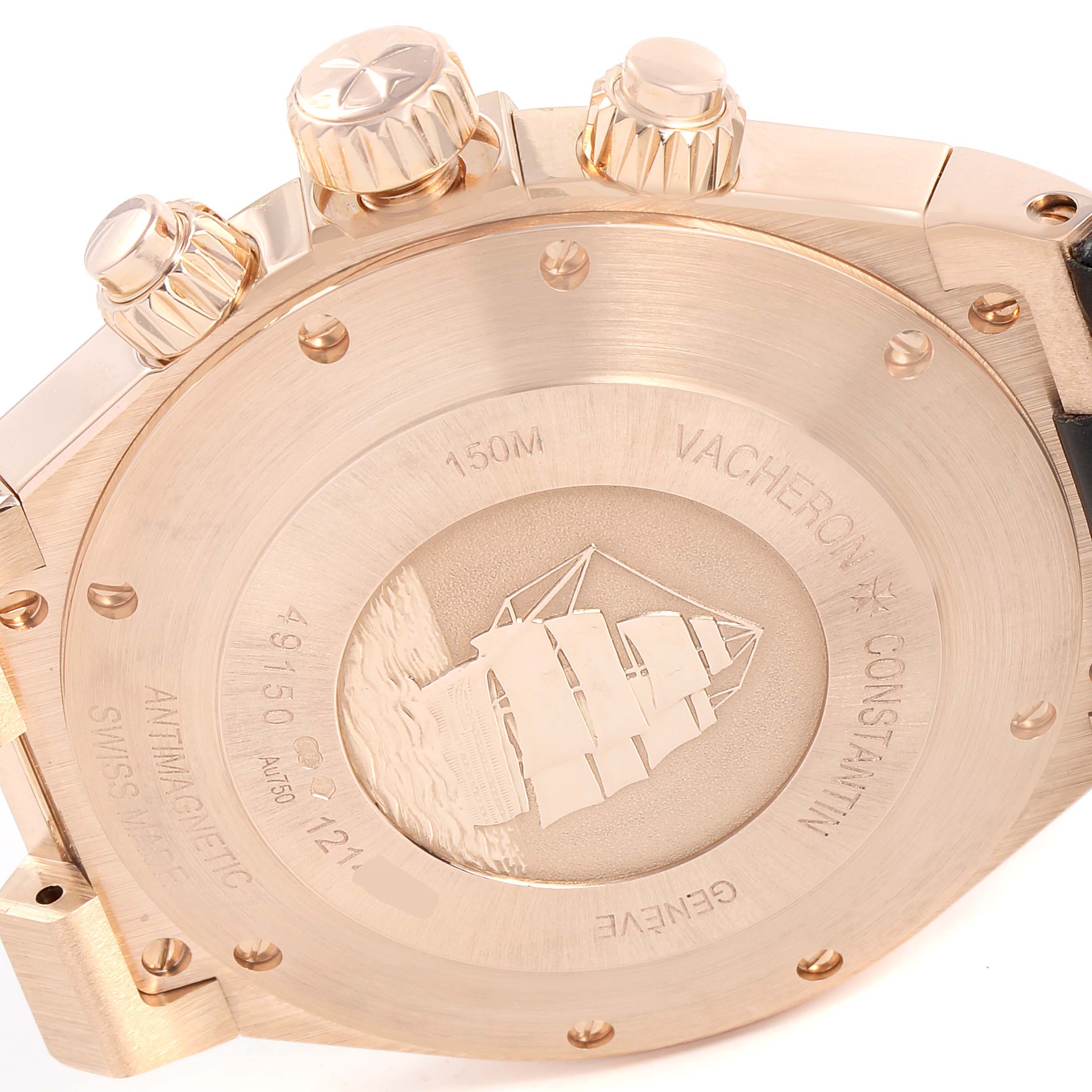 The image shows the case back, crown, and pushers of the Vacheron Constantin Overseas 49150/000R-9338 Men's Rose Gold Brown Dial 49150/000R-9338 Men's Rose Gold Brown Dial watch.