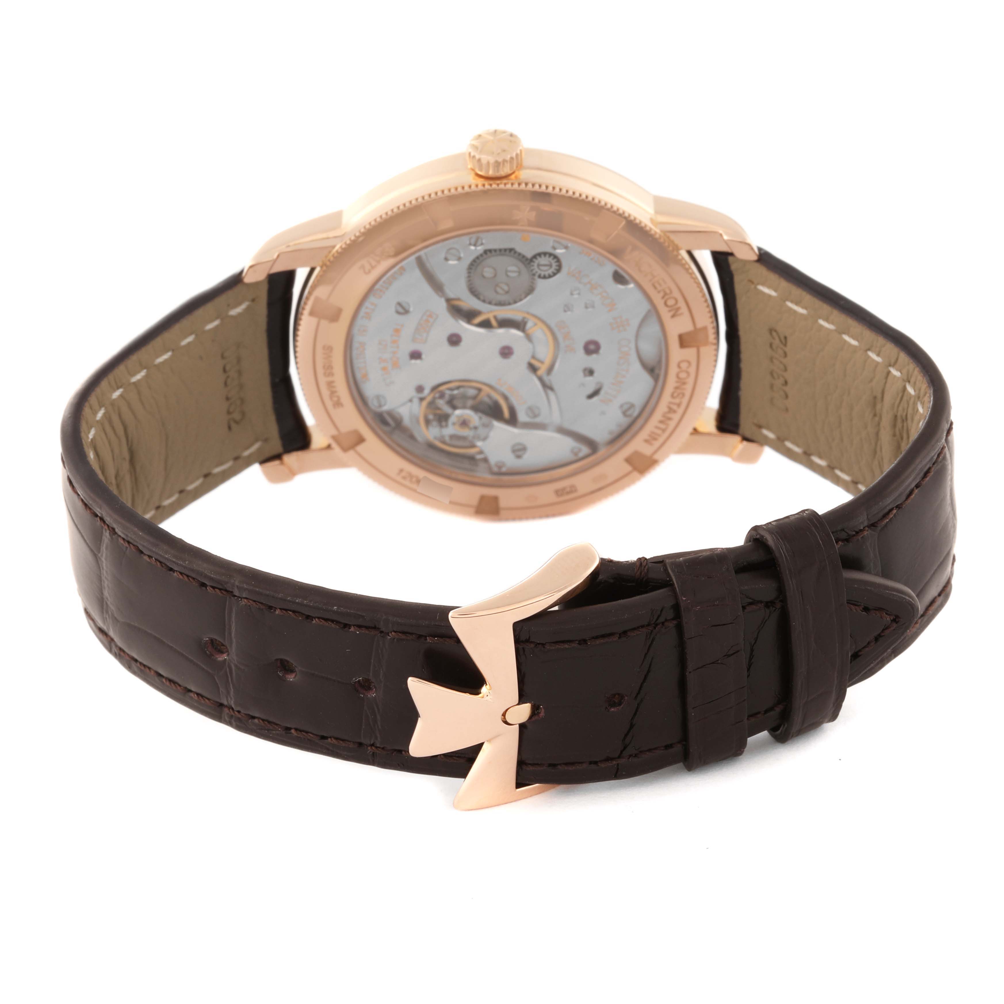 This image shows the back view of a Vacheron Constantin Traditionnelle 82172/000R-9382 Men's Rose Gold Silver Dial 82172/000R-9382 Men's Rose Gold Silver Dial watch, displaying its movement and leather strap with the clasp.
