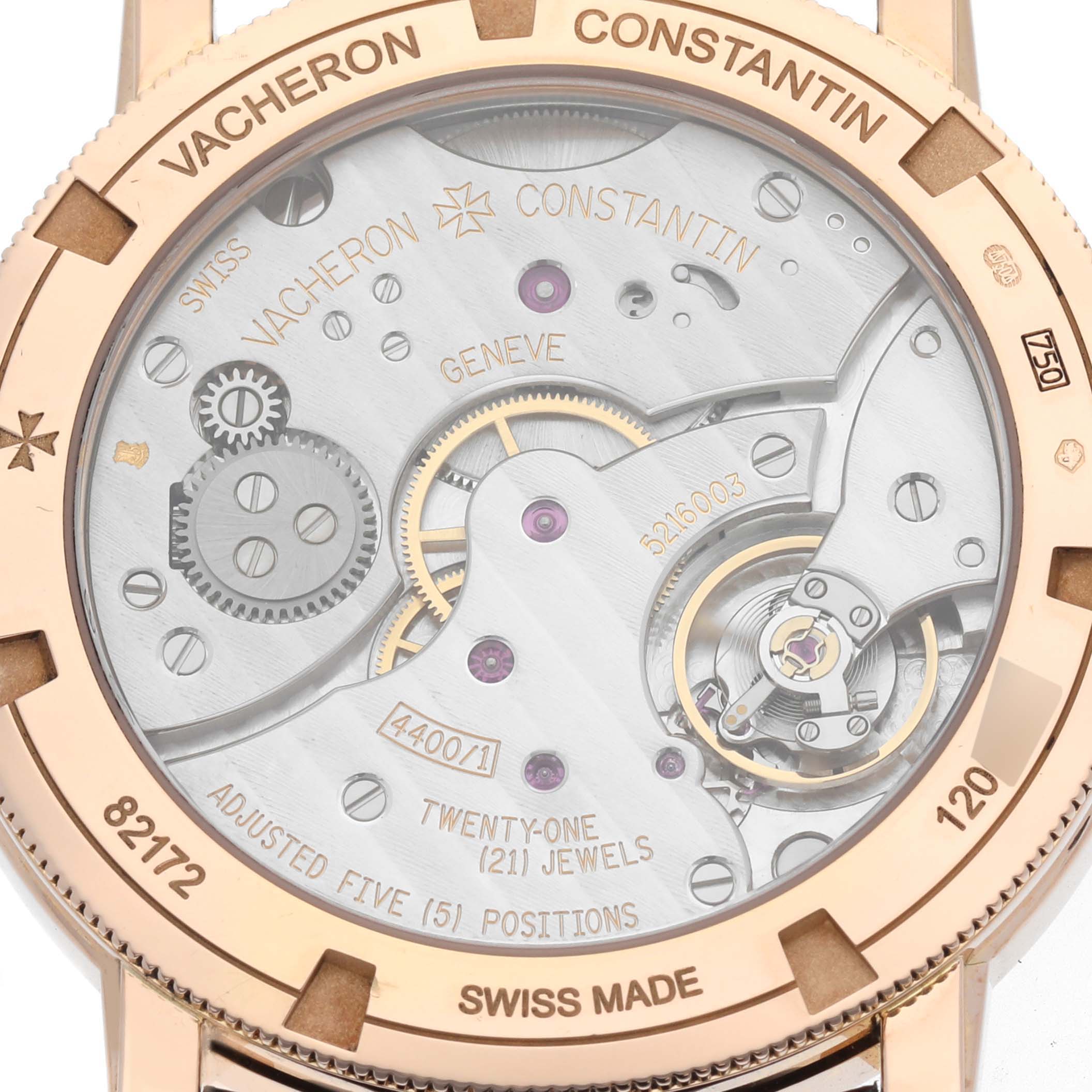 This Vacheron Constantin Traditionnelle 82172/000R-9382 Men's Rose Gold Silver Dial 82172/000R-9382 Men's Rose Gold Silver Dial watch is shown from the back, displaying its intricate mechanical movement and engravings.