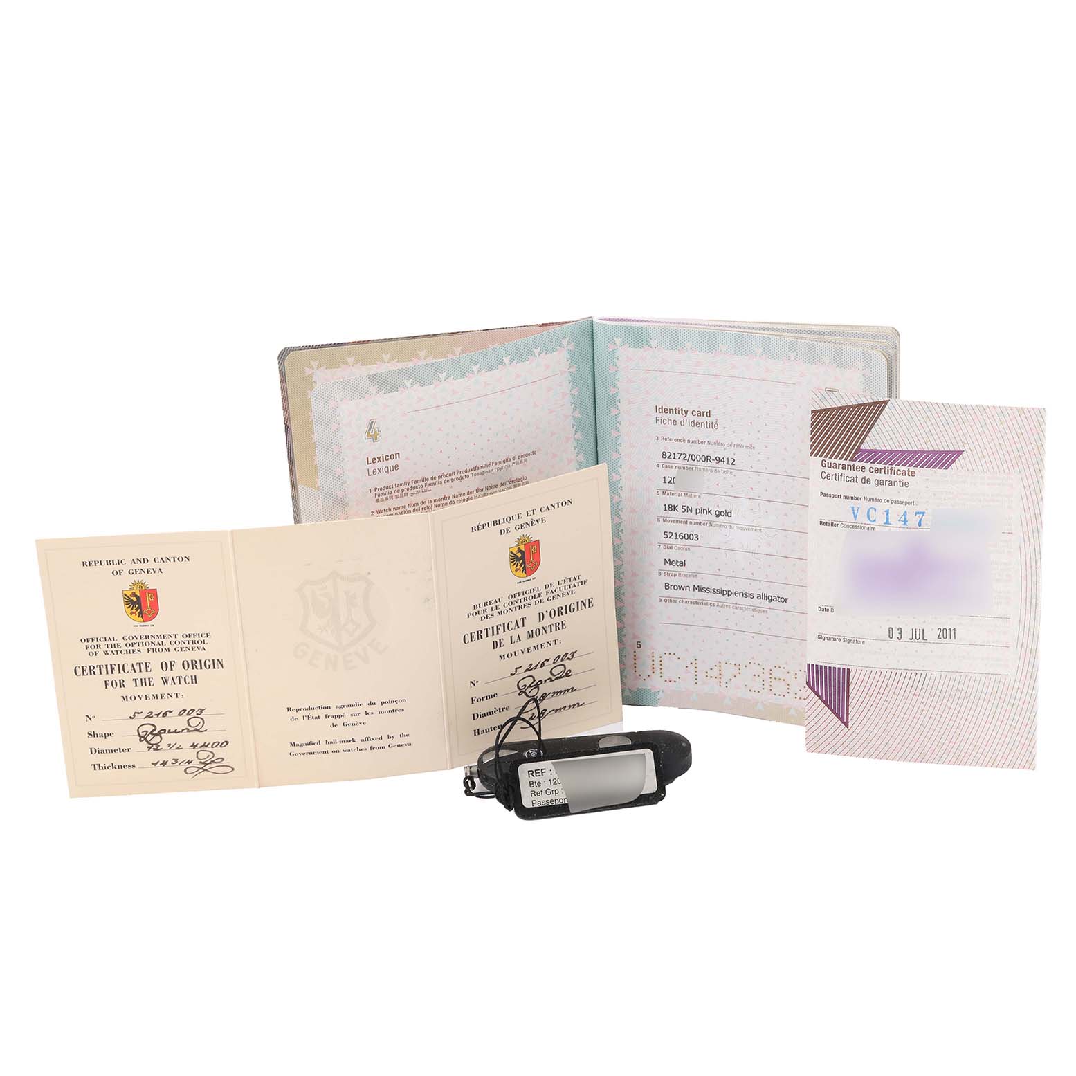 The image shows certificates and documents for the Vacheron Constantin Traditionnelle 82172/000R-9382 Men's Rose Gold Silver Dial 82172/000R-9382 Men's Rose Gold Silver Dial watch model displayed from an overhead angle.