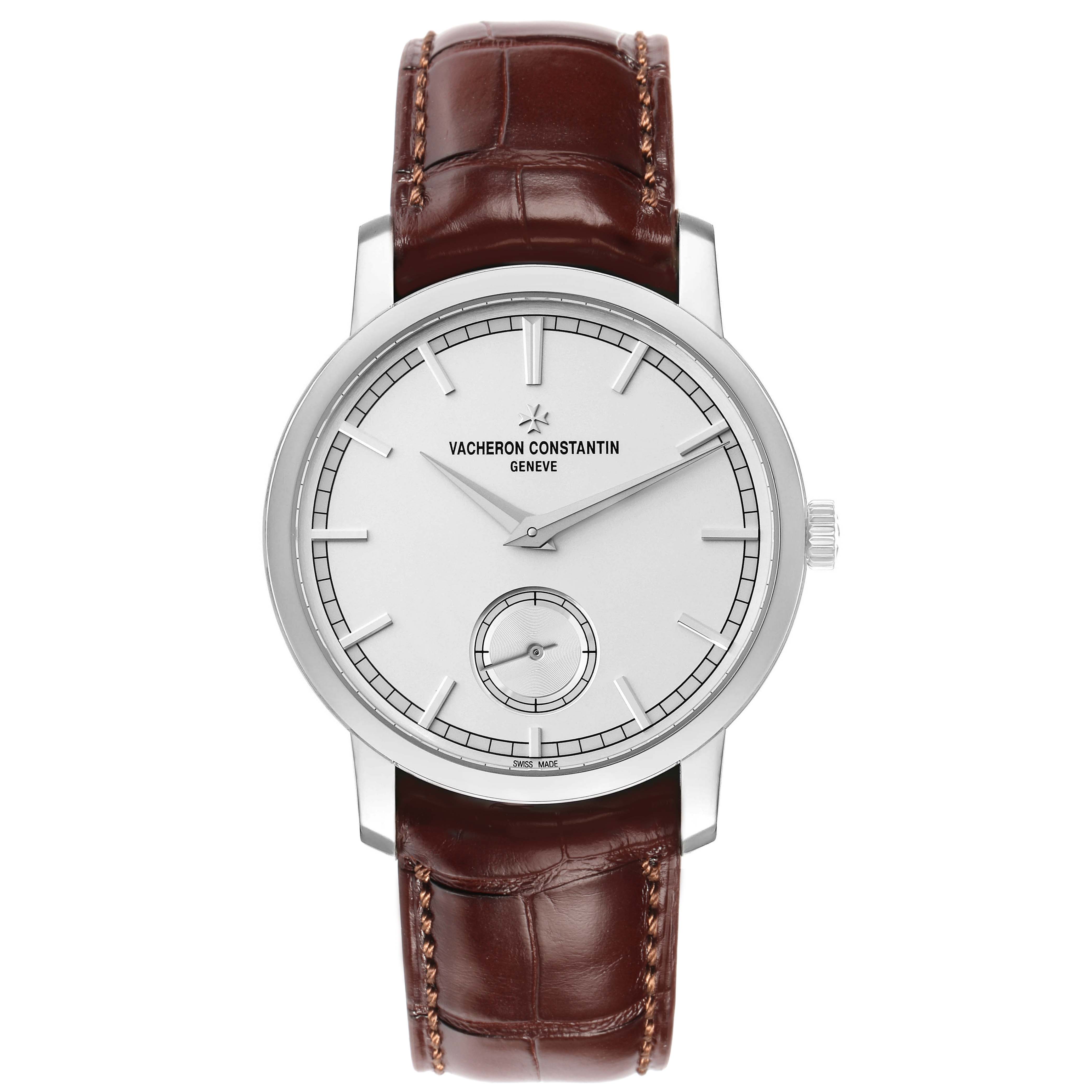 The Vacheron Constantin Traditionnelle 82172G Men's White Gold Silver Dial watch is shown from a front angle, highlighting the dial, hands, and brown leather strap.
