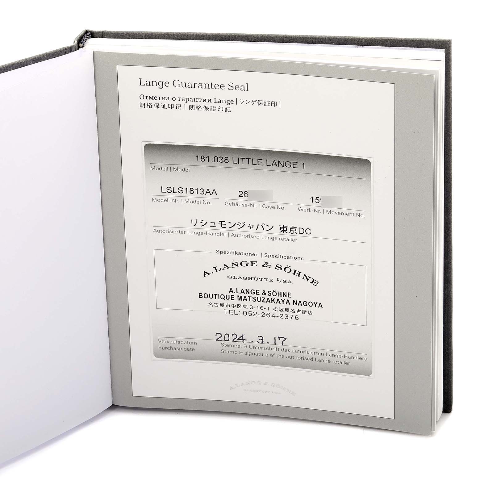 The image shows the warranty and certificate booklet for the Lange 1 model by A. Lange & Söhne, displaying model and purchase information.