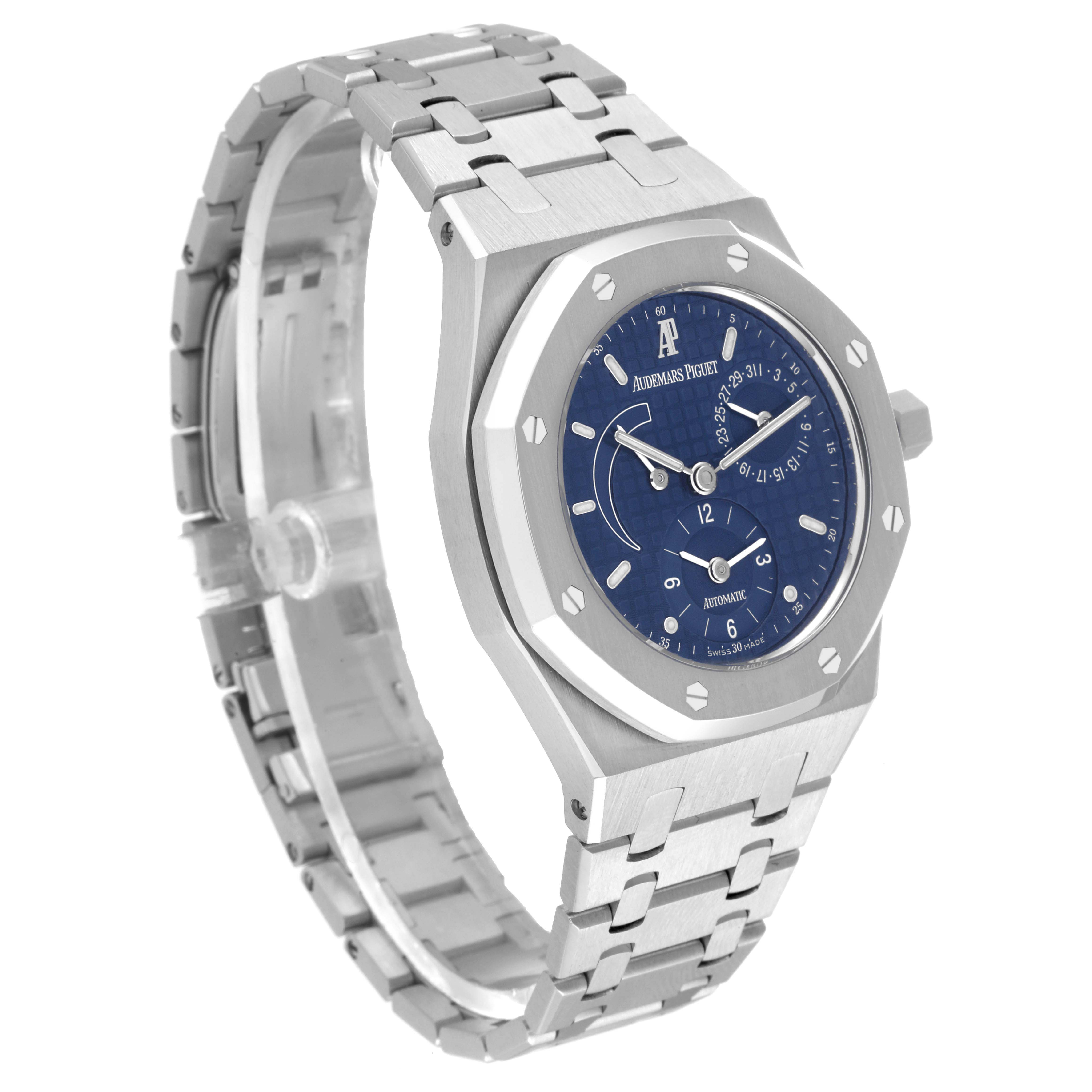 The image shows a side angle view of an Audemars Piguet Royal Oak 25730ST Men's Stainless Steel Blue Dial 25730ST Men's Stainless Steel Blue Dial watch, highlighting its metal bracelet and blue dial.