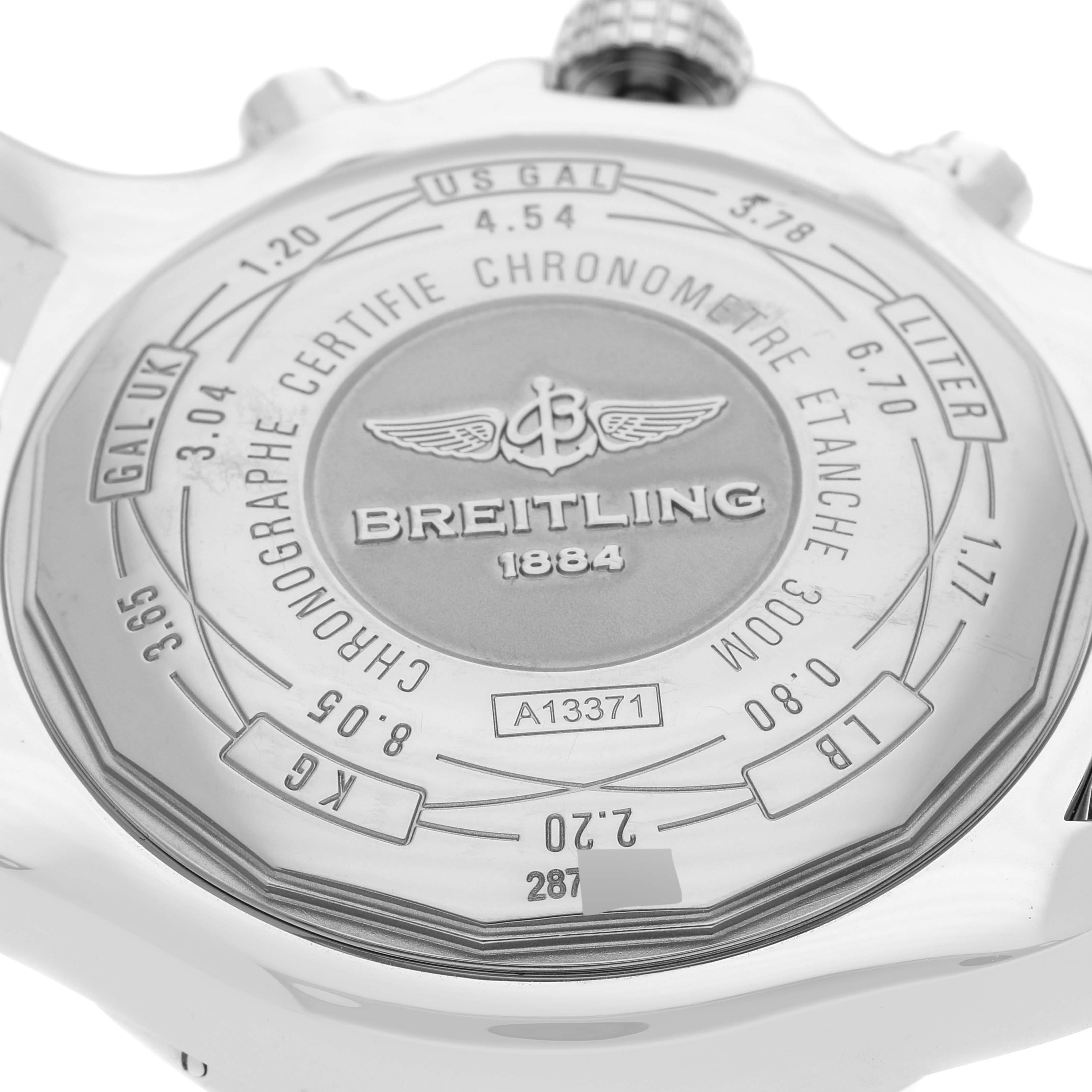 The image shows the back case of a Breitling Avenger A13371 Men's Stainless Steel Black Dial A13371 Men's Stainless Steel Black Dial watch, highlighting its engravings and specifications.