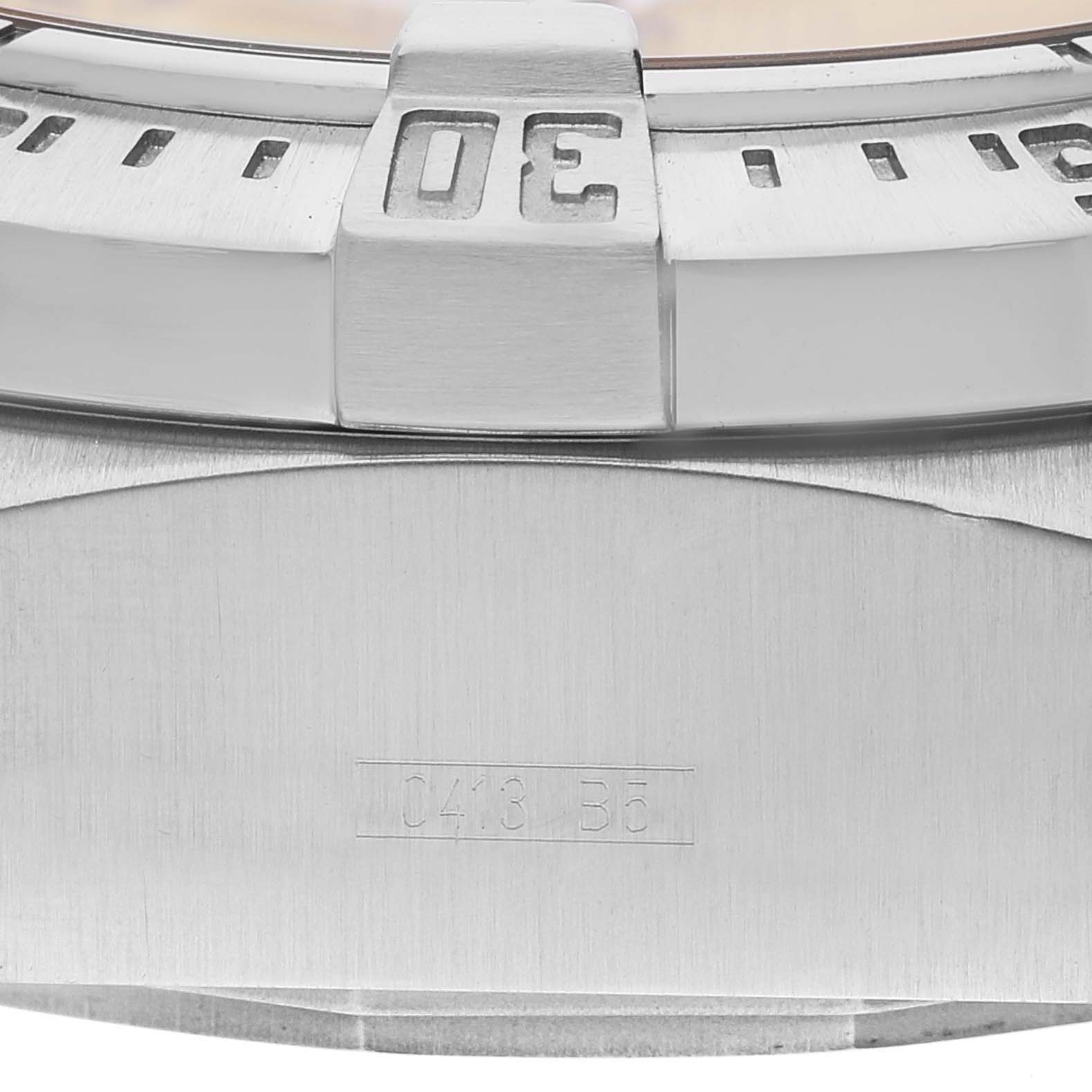 This image features a close-up of the case side, bezel, and engraved serial number of a Breitling Avenger A17330 Men's Stainless Steel Yellow Dial A17330 Men's Stainless Steel Yellow Dial watch.