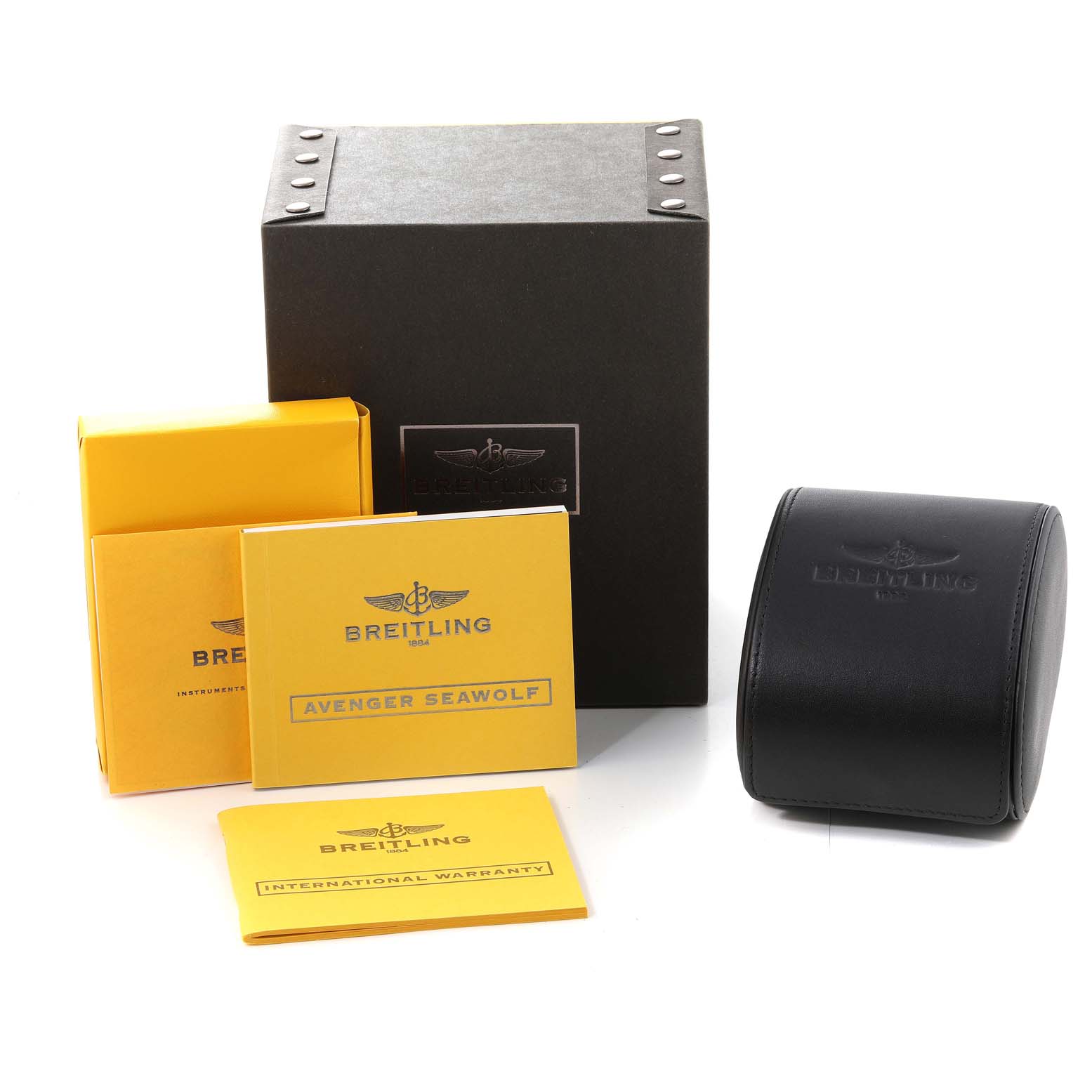 The image shows the packaging and documentation for a Breitling Avenger A17330 Men's Stainless Steel Yellow Dial A17330 Men's Stainless Steel Yellow Dial Seawolf watch including a box, leather case, and manuals.