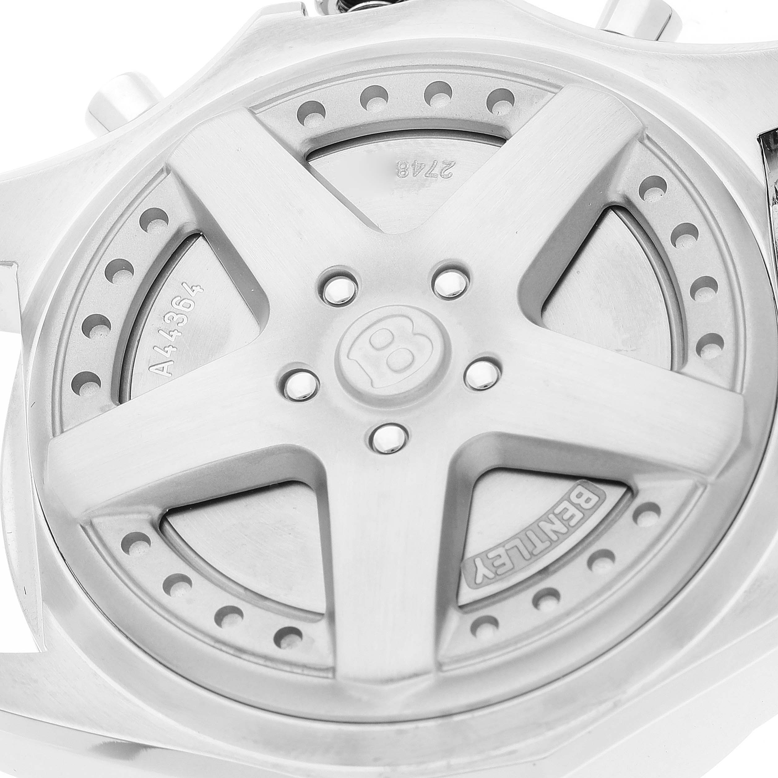 This image shows the back case of a Breitling Bentley A44364 Men's Stainless Steel Black Dial A44364 Men's Stainless Steel Black Dial watch, highlighting its intricate wheel spoke design and brand engraving.