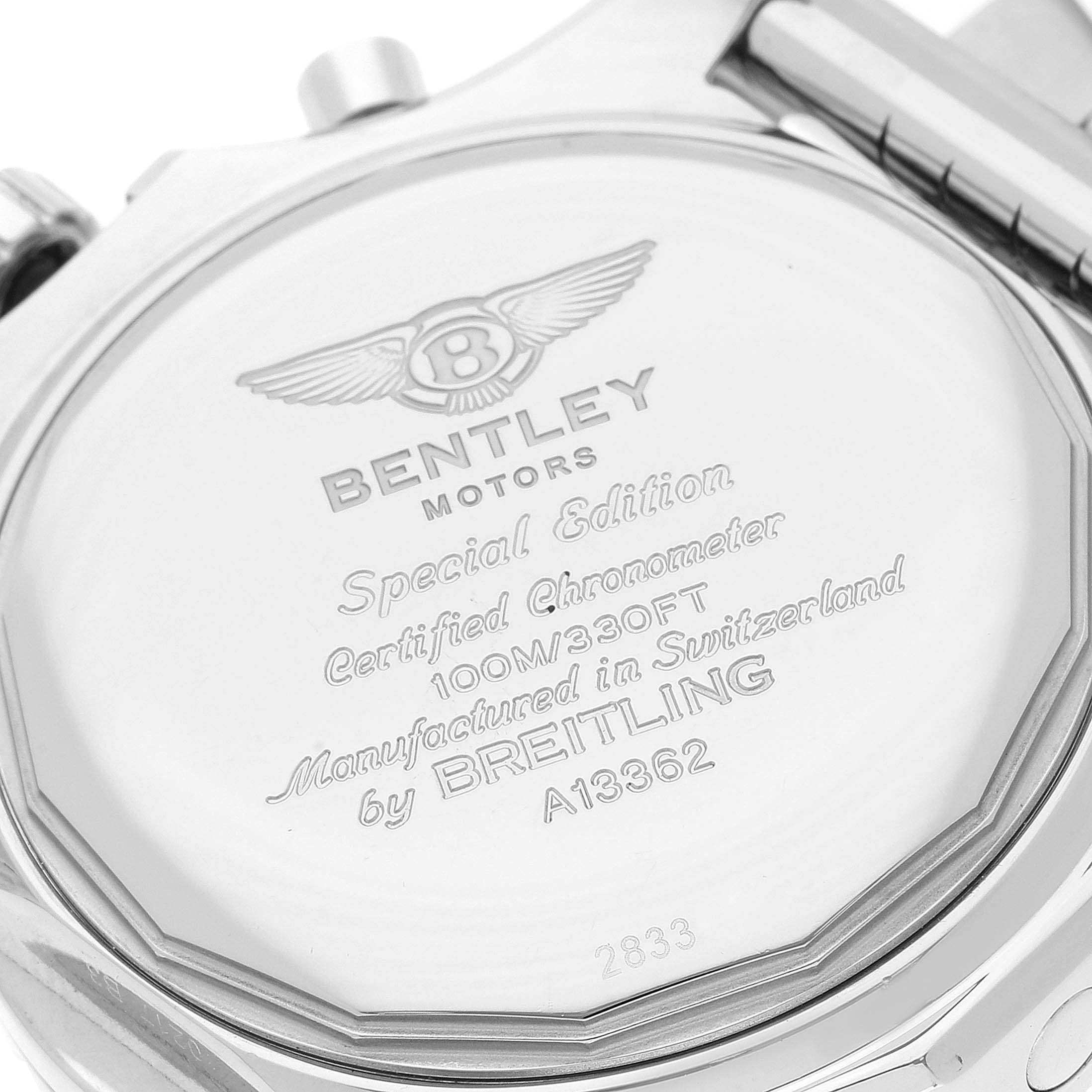 The image shows the back case of a Bentley model watch by Breitling from an angled close-up perspective.