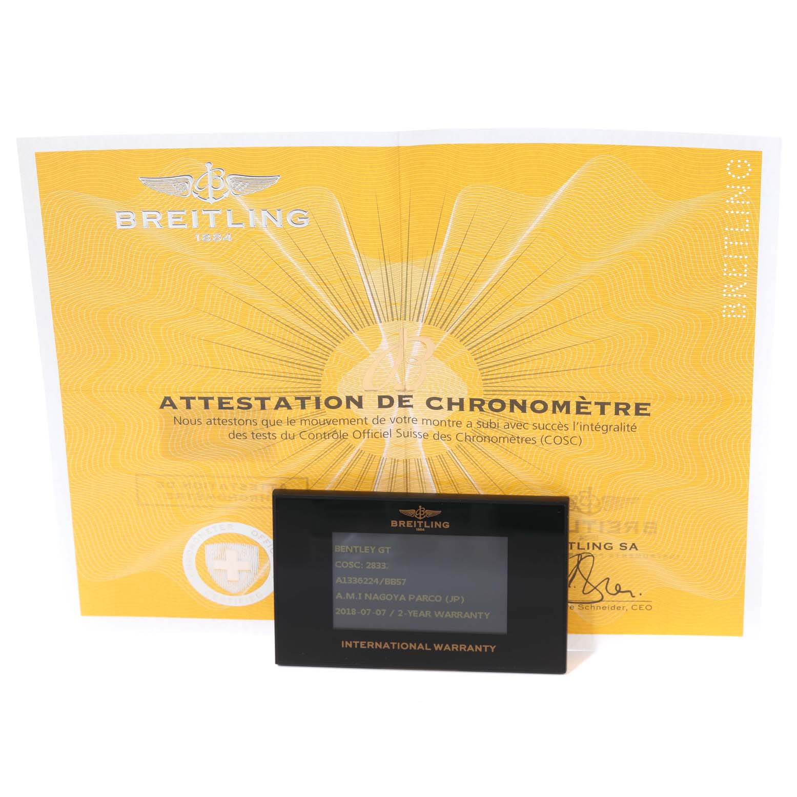 The image shows the Breitling Bentley A13362 Men's Stainless Steel Black Dial A13362 Men's Stainless Steel Black Dial GT warranty card and chronometer certificate viewed from the front.