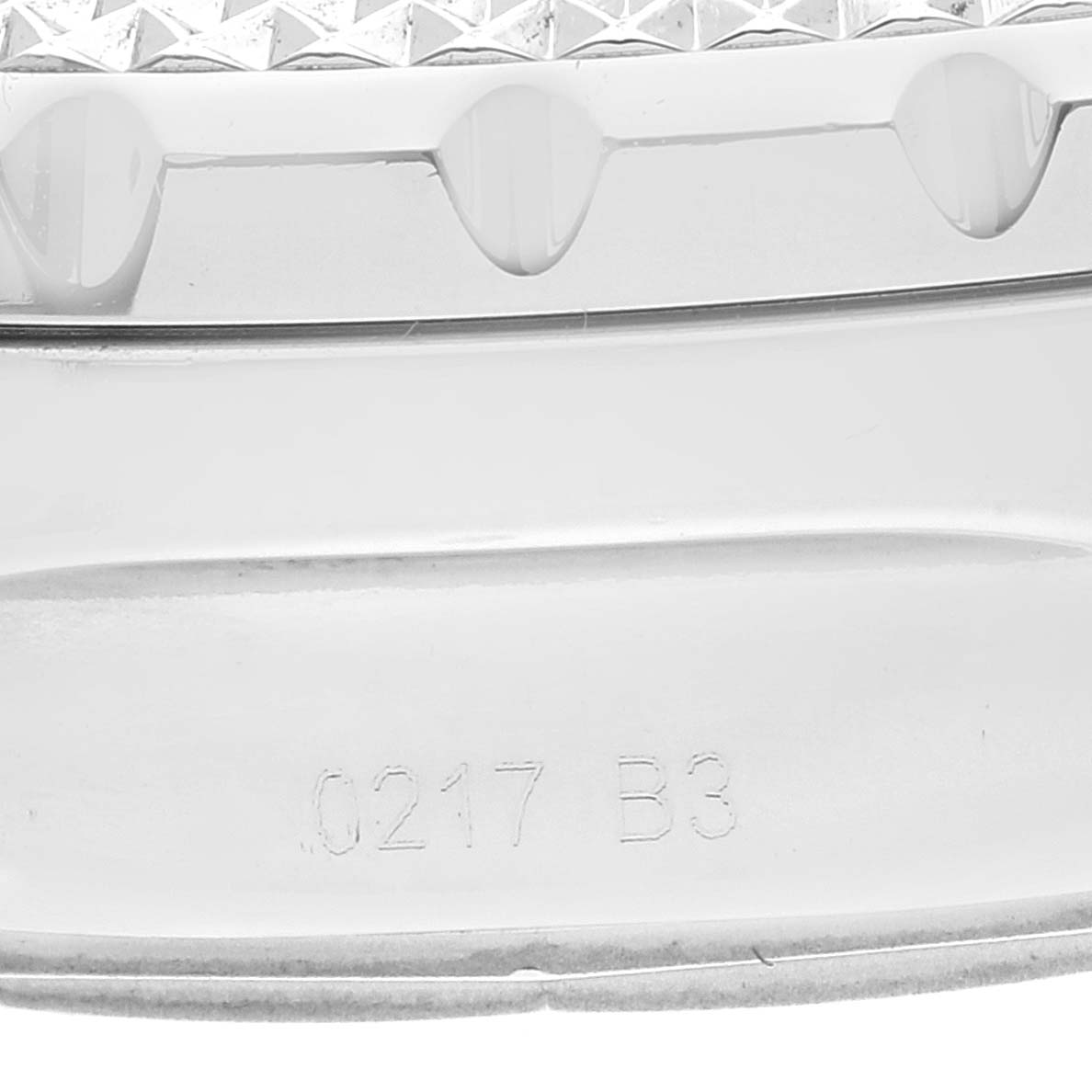 This image shows a close-up of the engraved bezel and part of the case of the Breitling Bentley A13362 Men's Stainless Steel Black Dial A13362 Men's Stainless Steel Black Dial watch model.