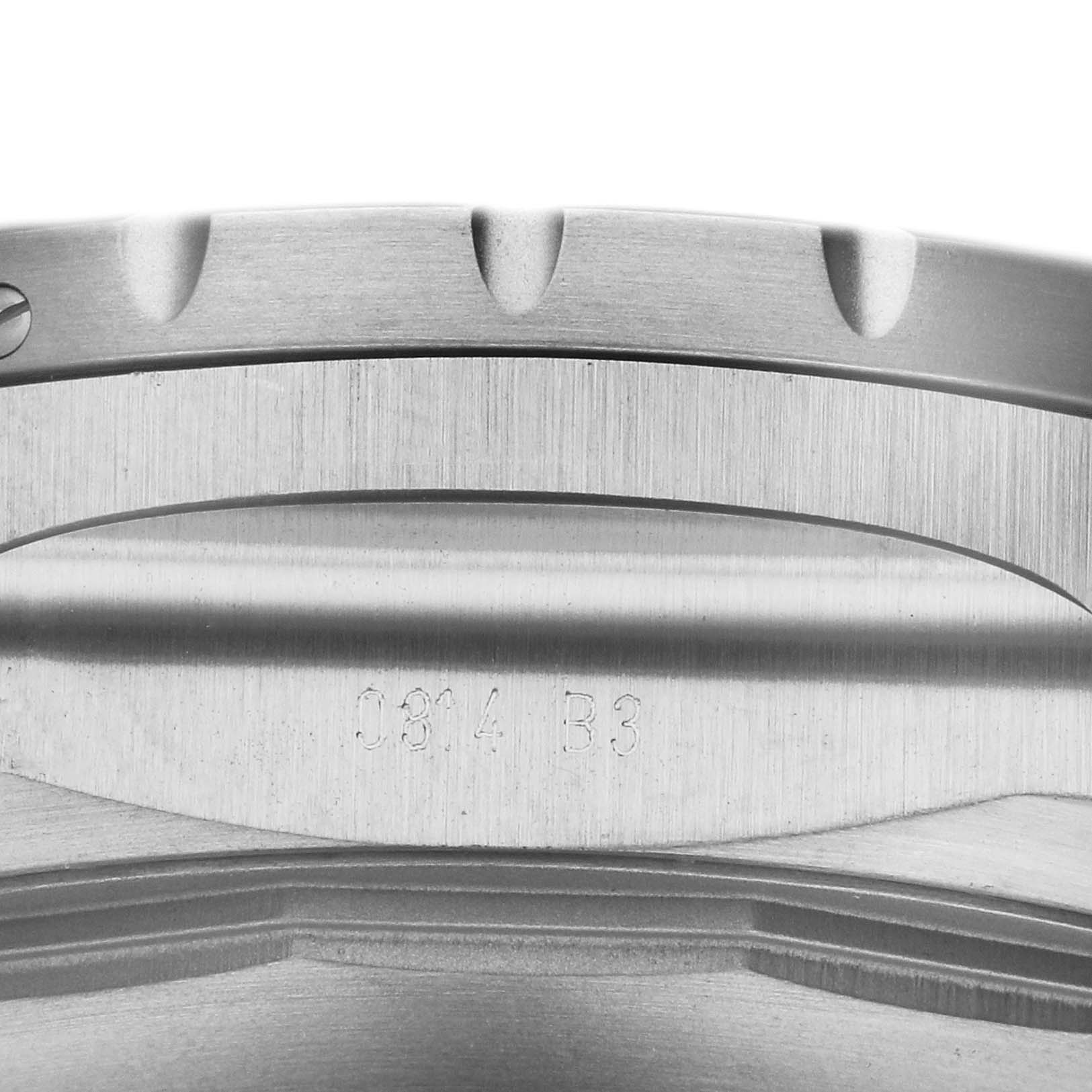 This image shows a close-up of the side and case back of the Breitling Limited Series watch, featuring engraved details.