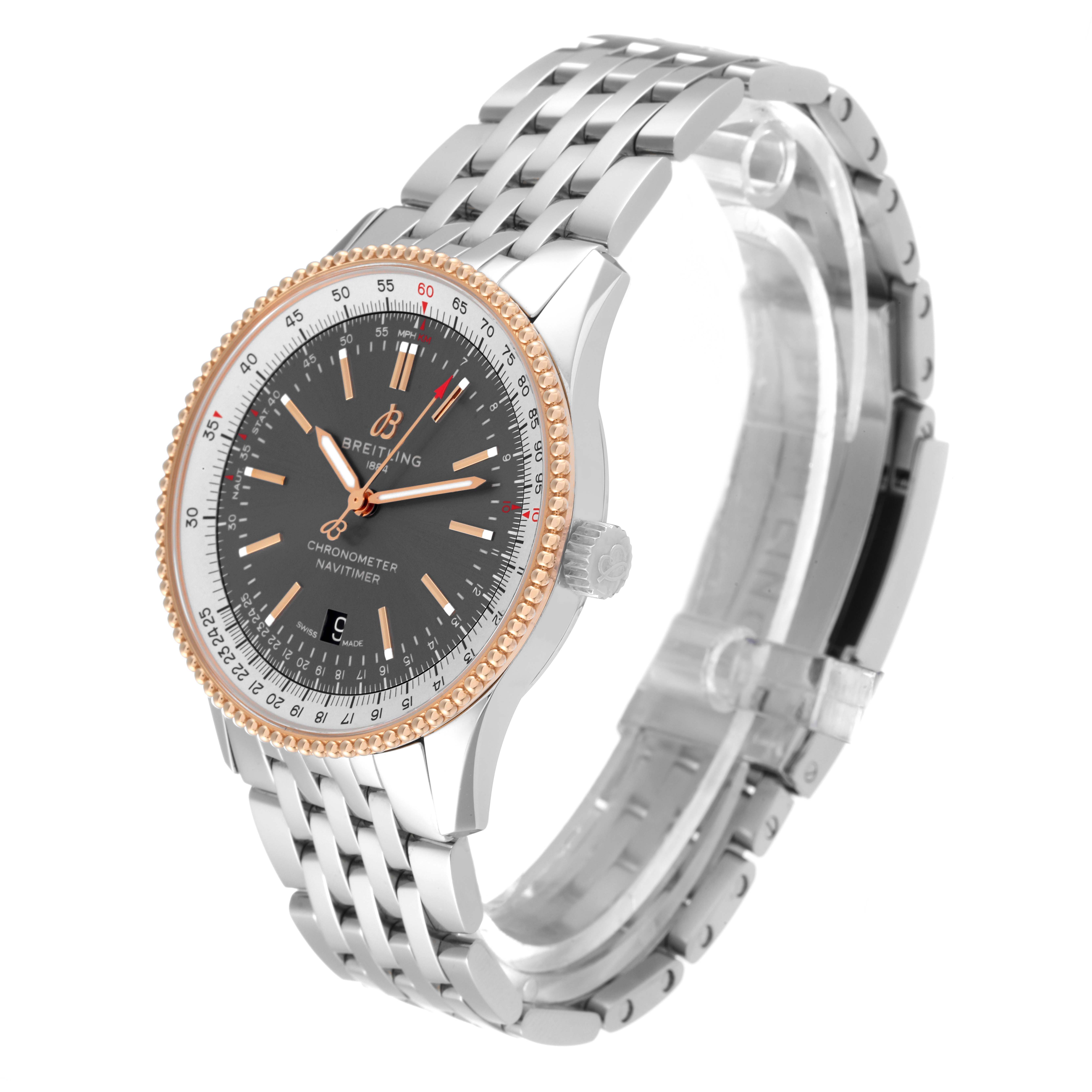 The image shows a Breitling Navitimer U17326 Men
s Stainless Steel Grey Dial U17326 Men
s Stainless Steel Grey Dial watch at an angle highlighting its face, bezel, crown, and bracelet with clasp.