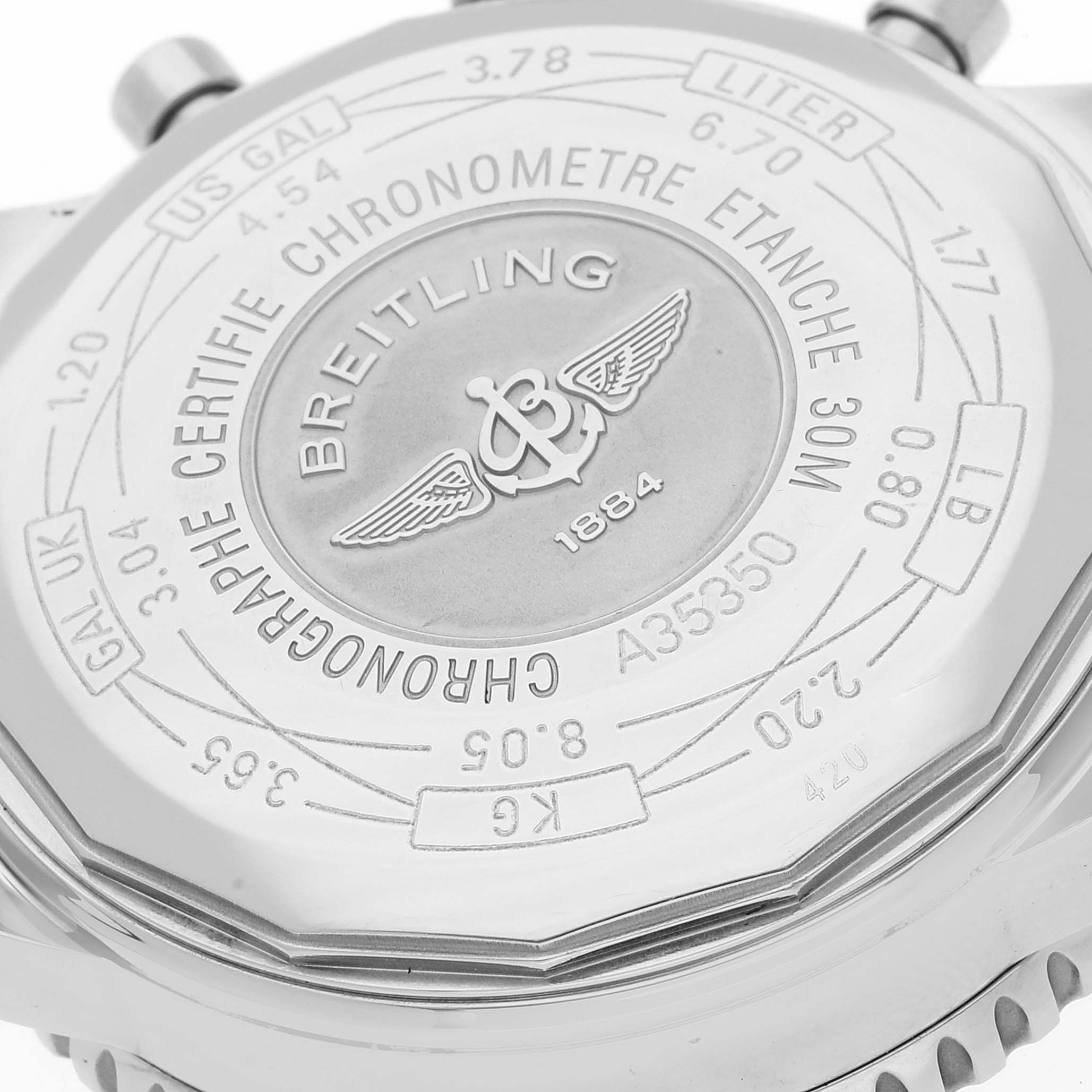 This image shows the case back of a Breitling Navitimer A35350 Men's Stainless Steel Blue Dial A35350 Men's Stainless Steel Blue Dial watch, featuring engraved details and branding.