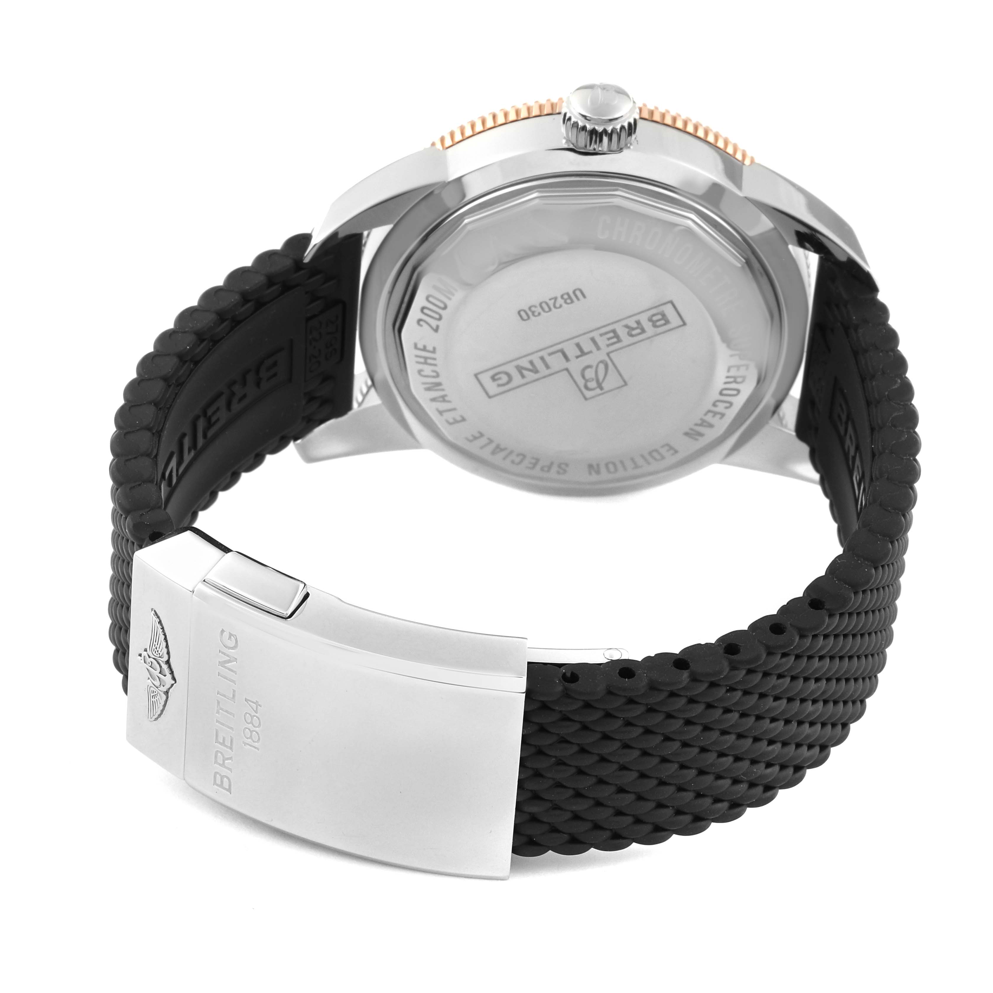 The image shows the back view of a Breitling Superocean UB2030121B1S1 Men
s Stainless Steel Black Dial UB2030121B1S1 Men
s Stainless Steel Black Dial watch, highlighting the caseback, crown, and rubber strap with a clasp.