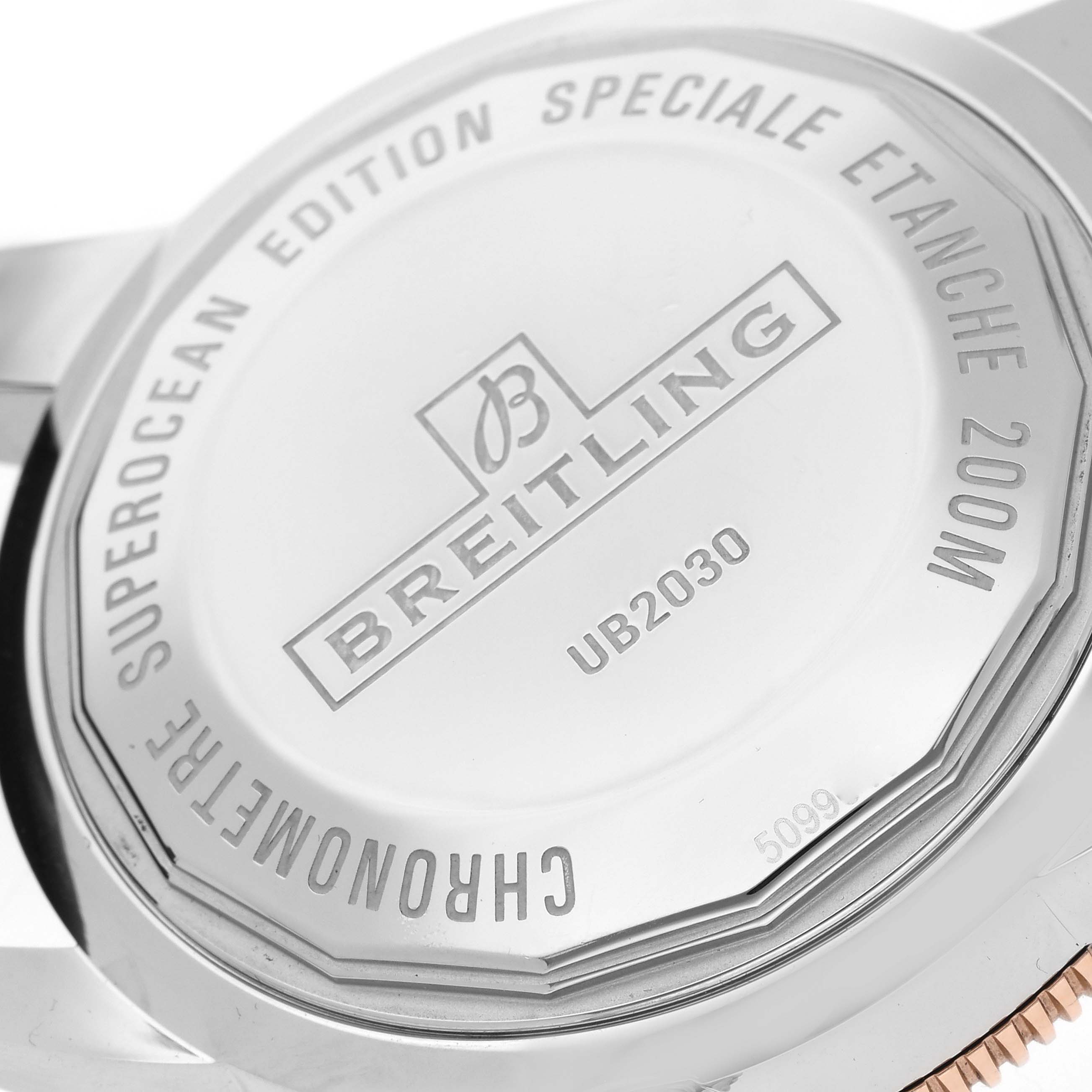 The image shows the stainless steel case back of a Breitling Superocean UB2030121B1S1 Men
s Stainless Steel Black Dial UB2030121B1S1 Men
s Stainless Steel Black Dial watch with engravings, model UB2030.