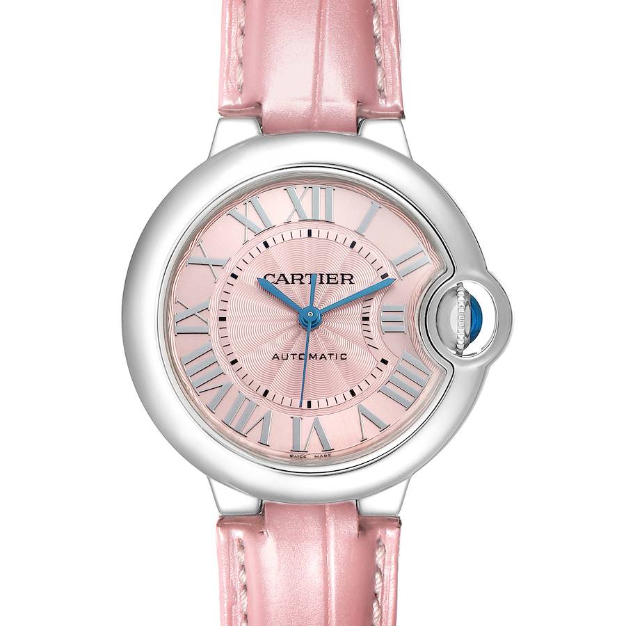 The Cartier Ballon Bleu WSBB0002 Women's Stainless Steel Pink Dial watch is shown from a top-down angle, displaying its pink dial, blue hands, and crown with a matching pink strap.