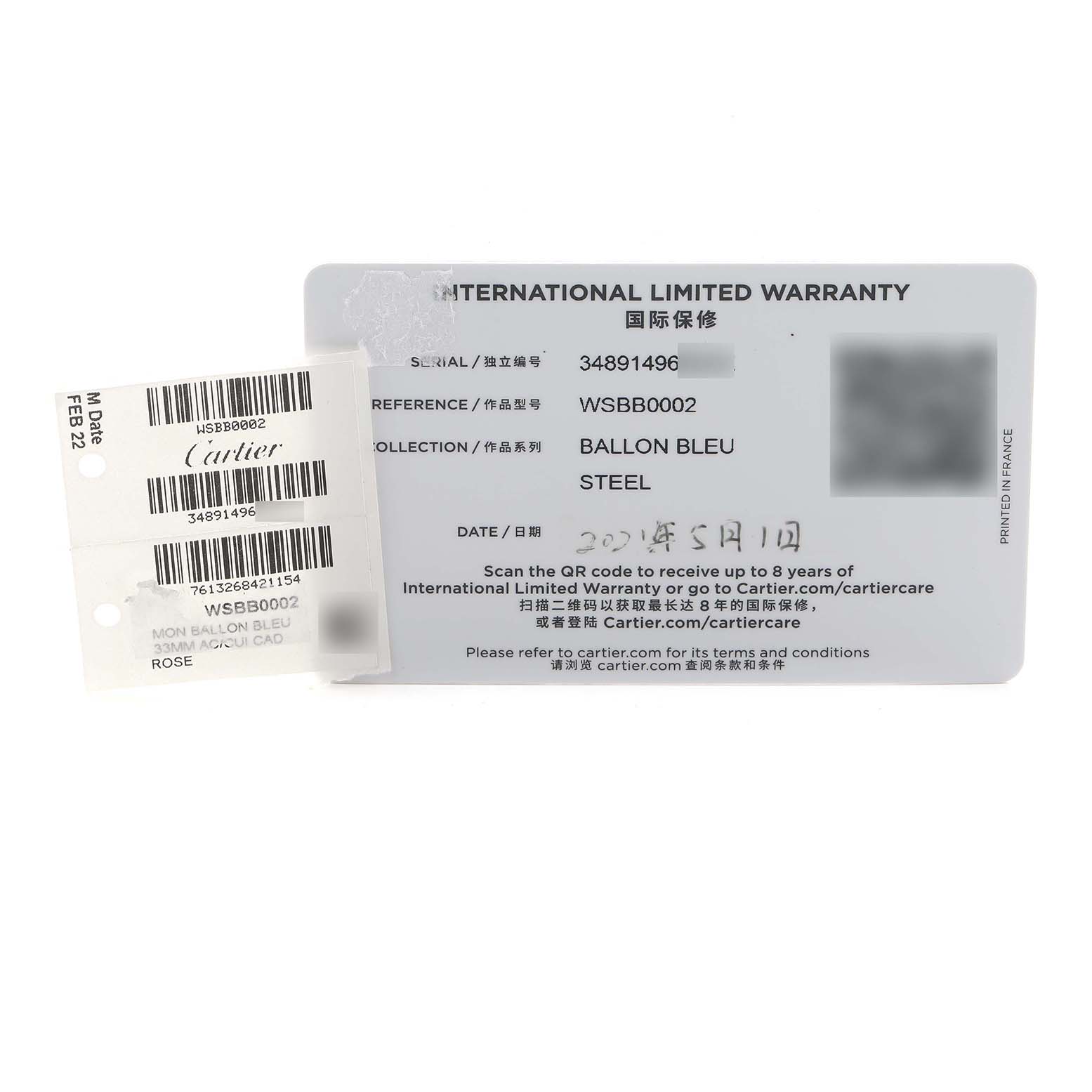 The image shows the warranty card and tag for the Cartier Ballon Bleu WSBB0002 Women
s Stainless Steel Pink Dial watch model.