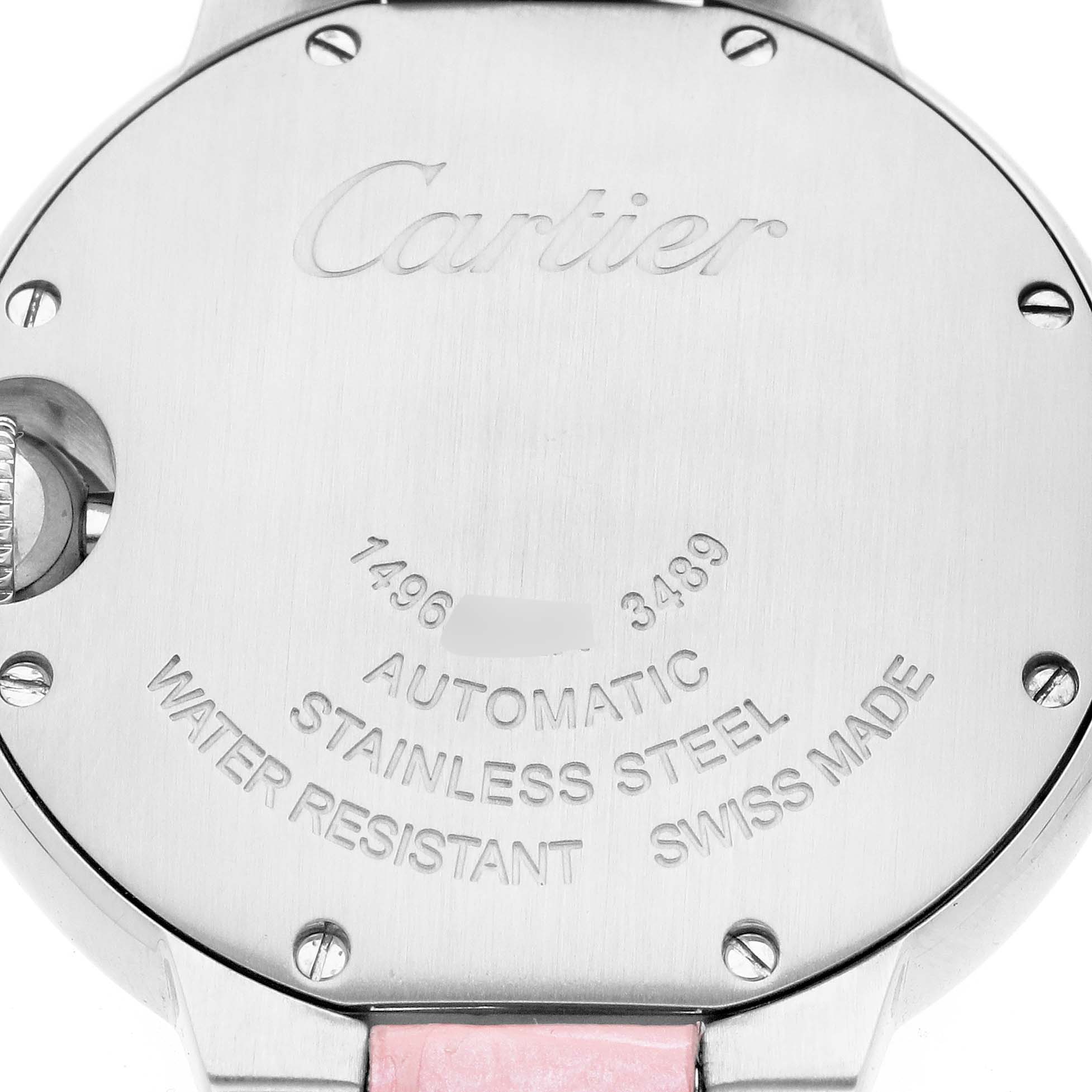The image shows the back of a Cartier Ballon Bleu WSBB0002 Women
s Stainless Steel Pink Dial watch, highlighting its engravings and stainless steel case.
