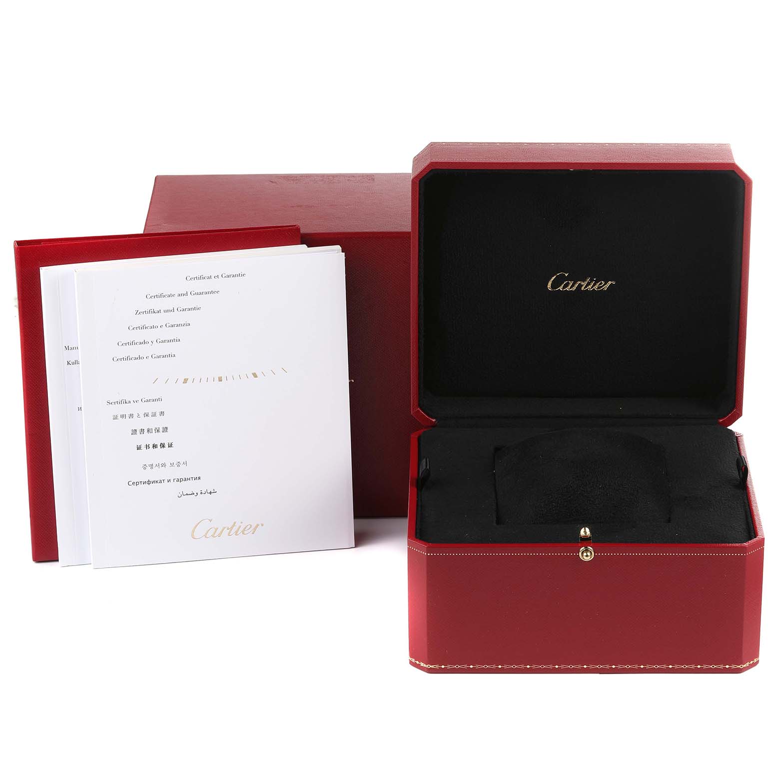 This image shows the packaging and manuals for the Calibre de Cartier watch by Cartier, including the watch box and guarantee certificates.