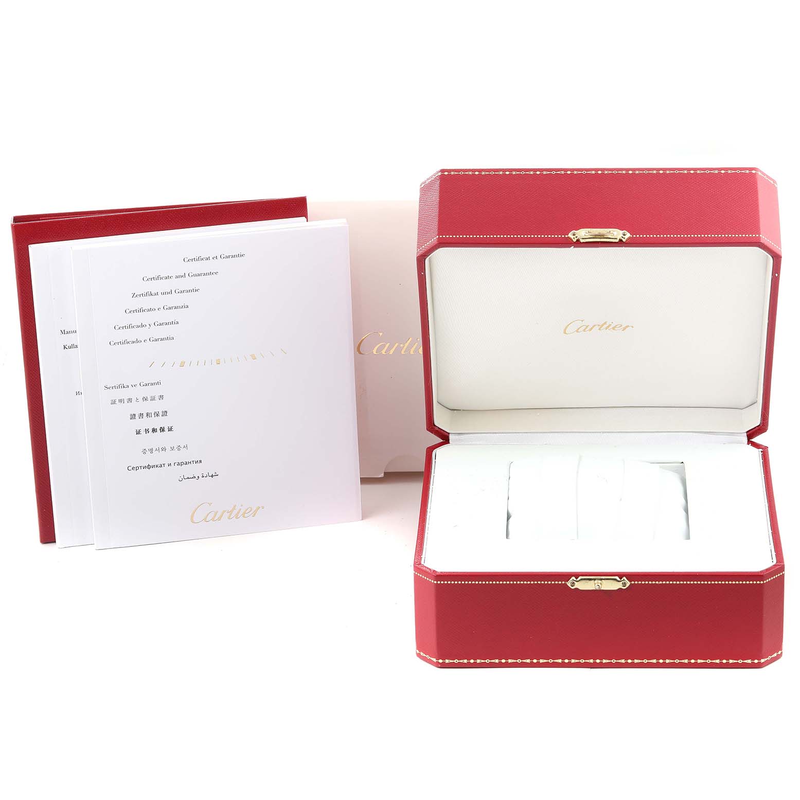 The image shows a red Cartier watch box for the Calibre de Cartier model, along with associated booklets and documents.