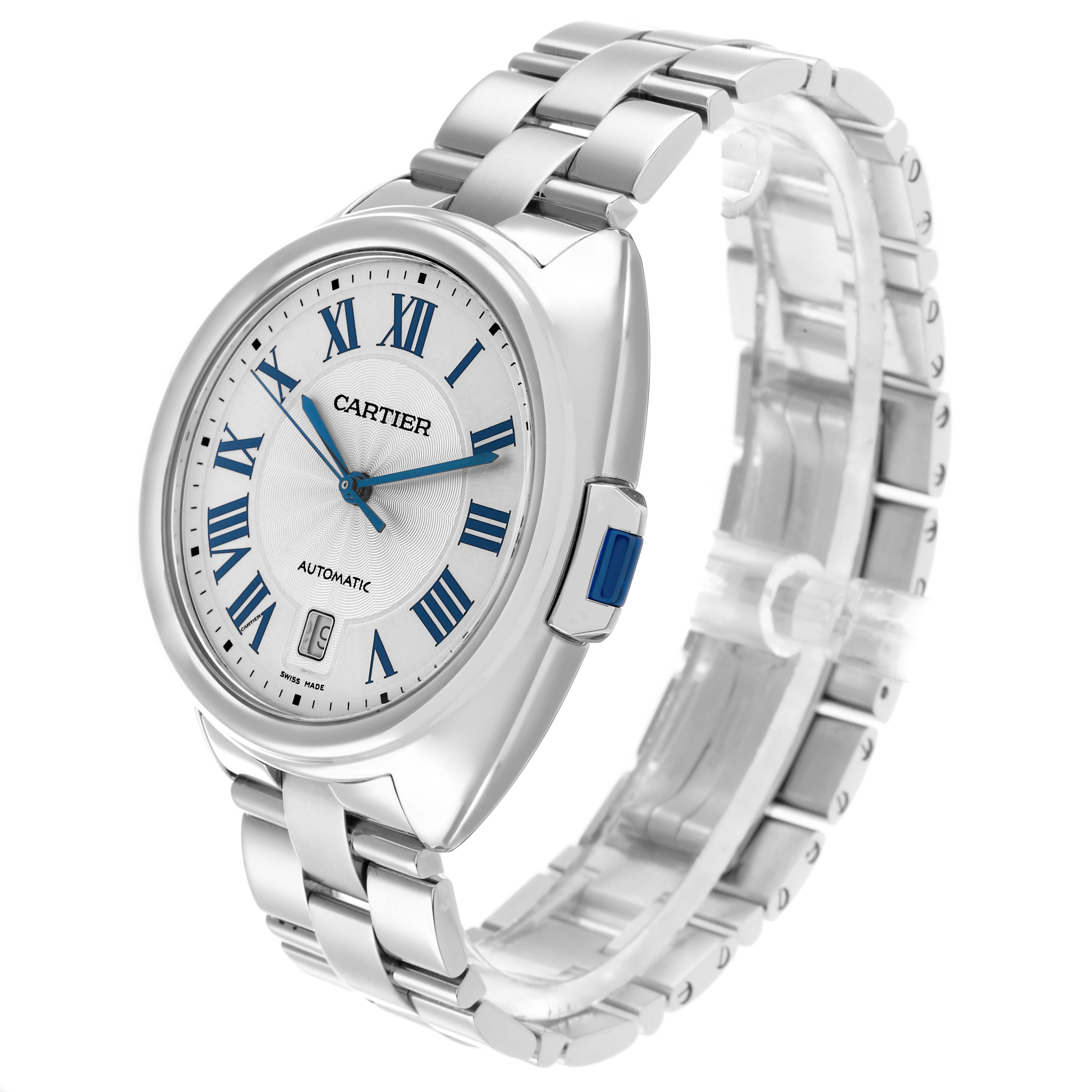 The Cartier Clé watch is shown at an angled side view, displaying the face, bezel, crown, and bracelet.