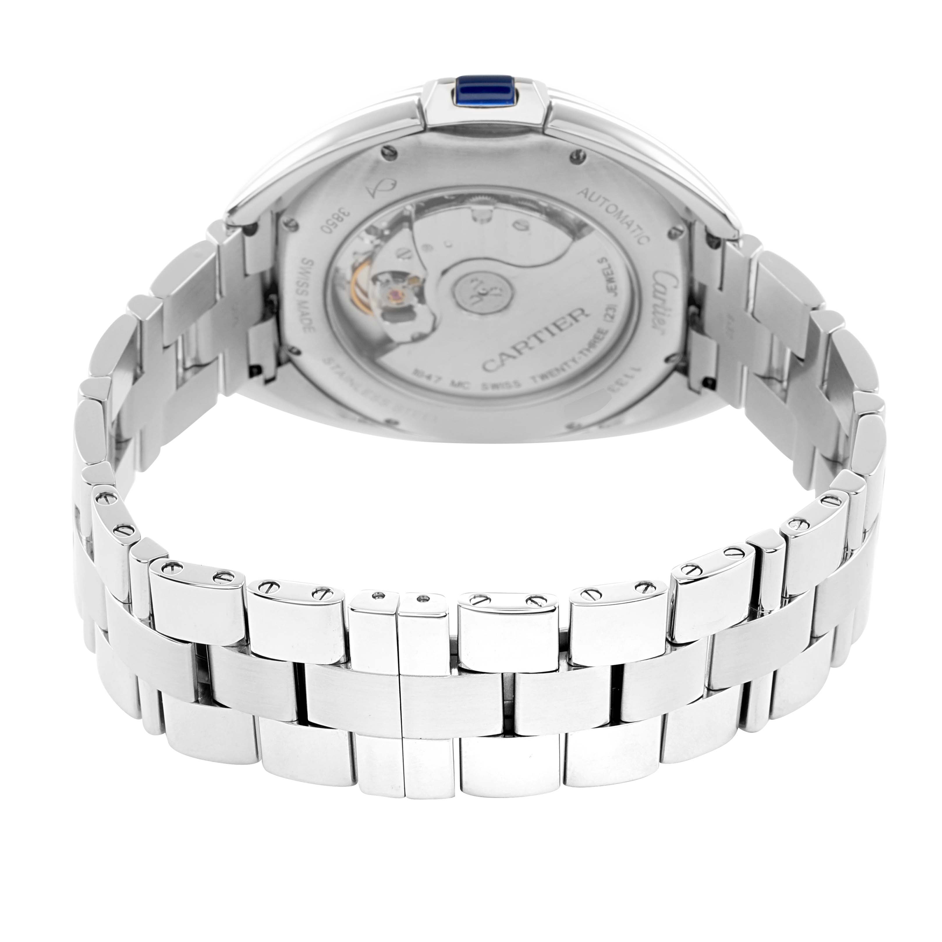 The image shows the back of the Cartier Clé watch, highlighting its automatic movement and metal bracelet.
