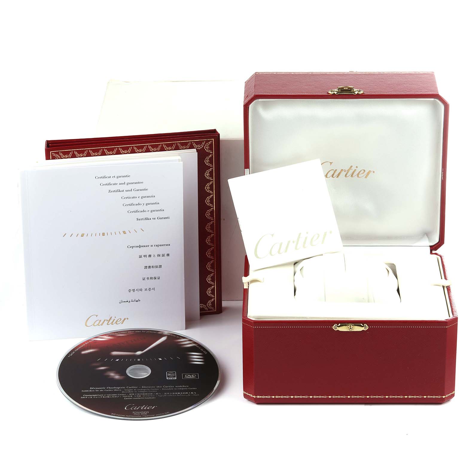 This image shows the box, warranty booklet, additional documents, and a CD for the Cartier Roadster W62017V3 Women's Stainless Steel Pink Dial W62017V3 Women's Stainless Steel Pink Dial watch.