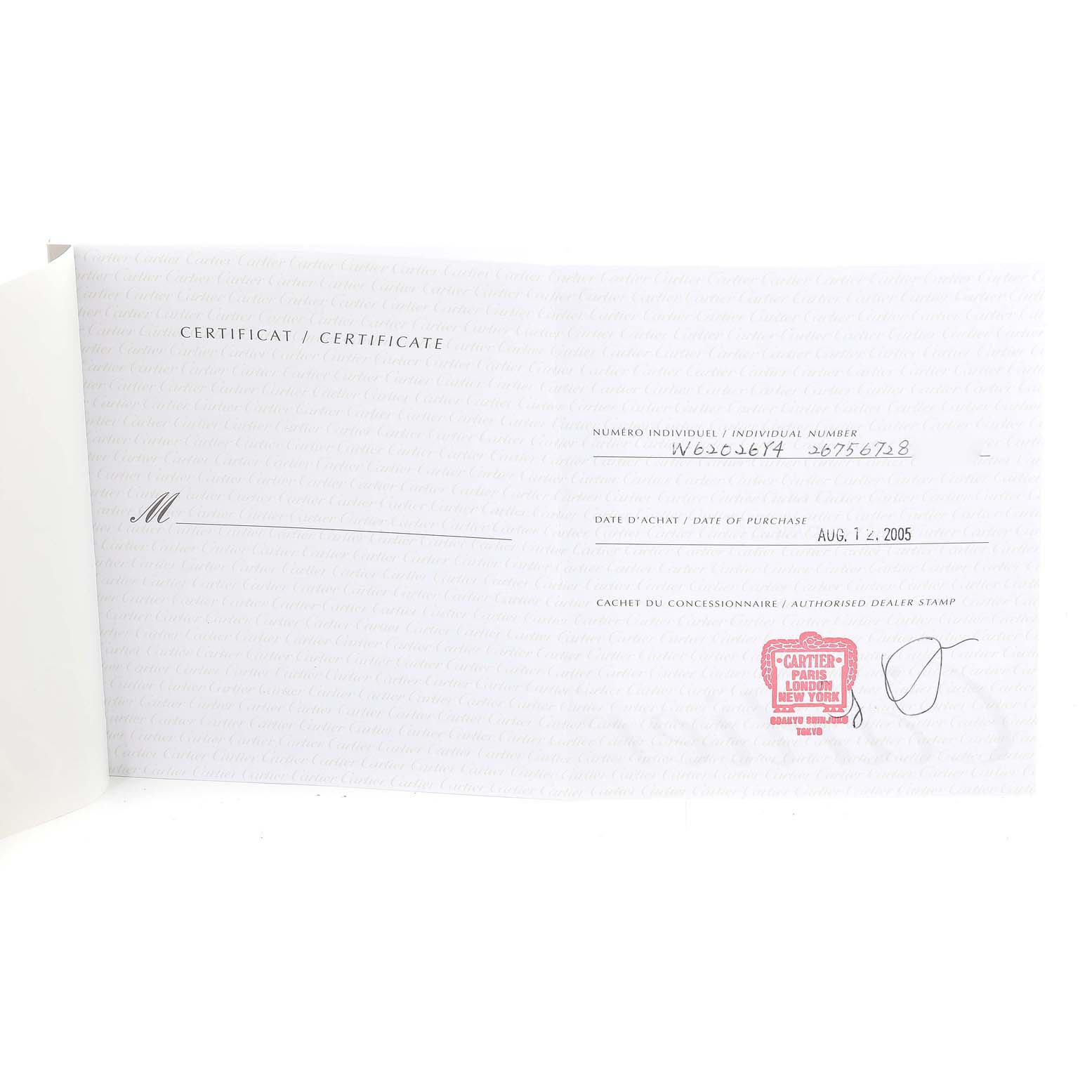 The image shows an open certificate booklet for the Cartier Roadster W62026Y4 Women
s Steel and Gold (two tone) Silver Dial W62026Y4 Women
s Steel and Gold (two tone) Silver Dial watch model, displaying purchase details and dealer stamp.