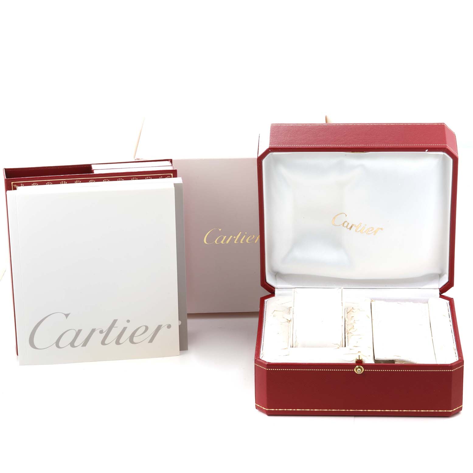 The image shows the packaging and accessories for a Cartier Roadster W62026Y4 Women
s Steel and Gold (two tone) Silver Dial W62026Y4 Women
s Steel and Gold (two tone) Silver Dial watch, including the booklet, outer box, and inner red watch box.