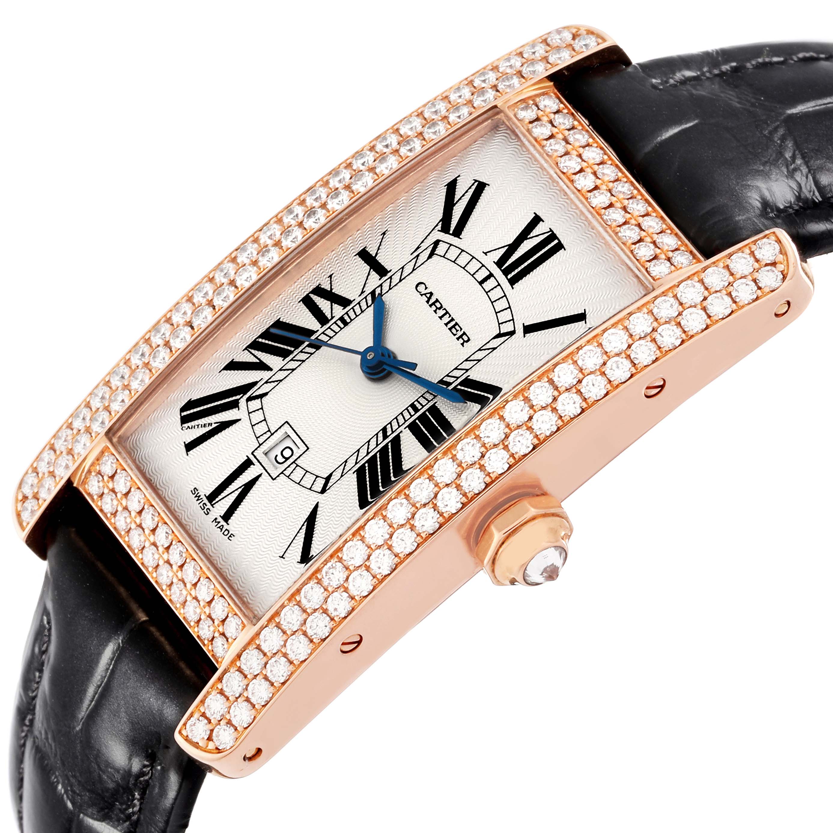 The Cartier Tank Américaine watch is shown at an angle, displaying the diamond-studded bezel and blue hands.