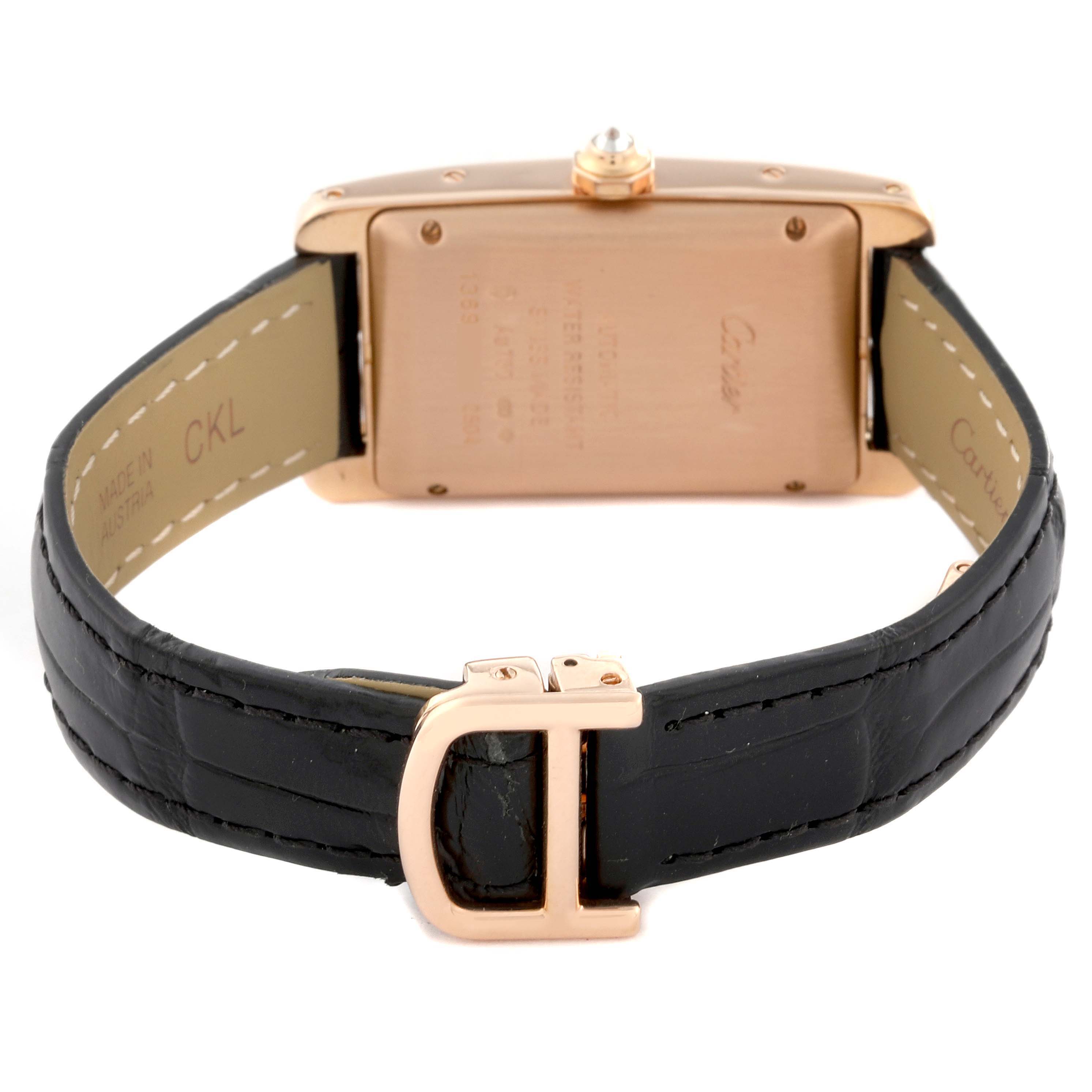 The image shows the back view of a Cartier Tank Americaine WB704751 Women's Rose Gold Silver Dial WB704751 Women's Rose Gold Silver Dial watch, highlighting the case back, strap, and buckle.