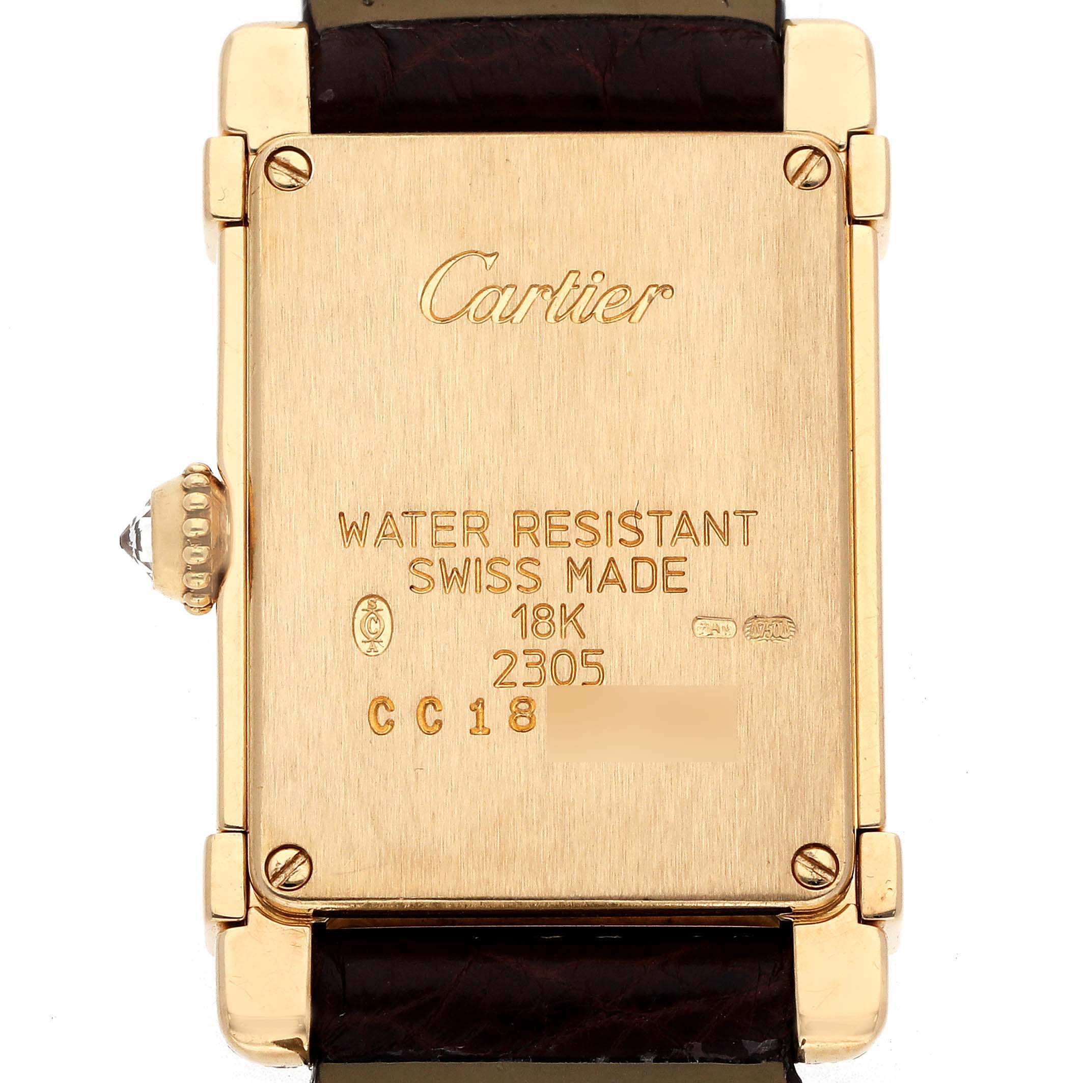The image shows the back of a Cartier Tank Louis 2305 Women
s Yellow Gold Silver Dial watch, highlighting the brand logo and technical details engraved on the casing.
